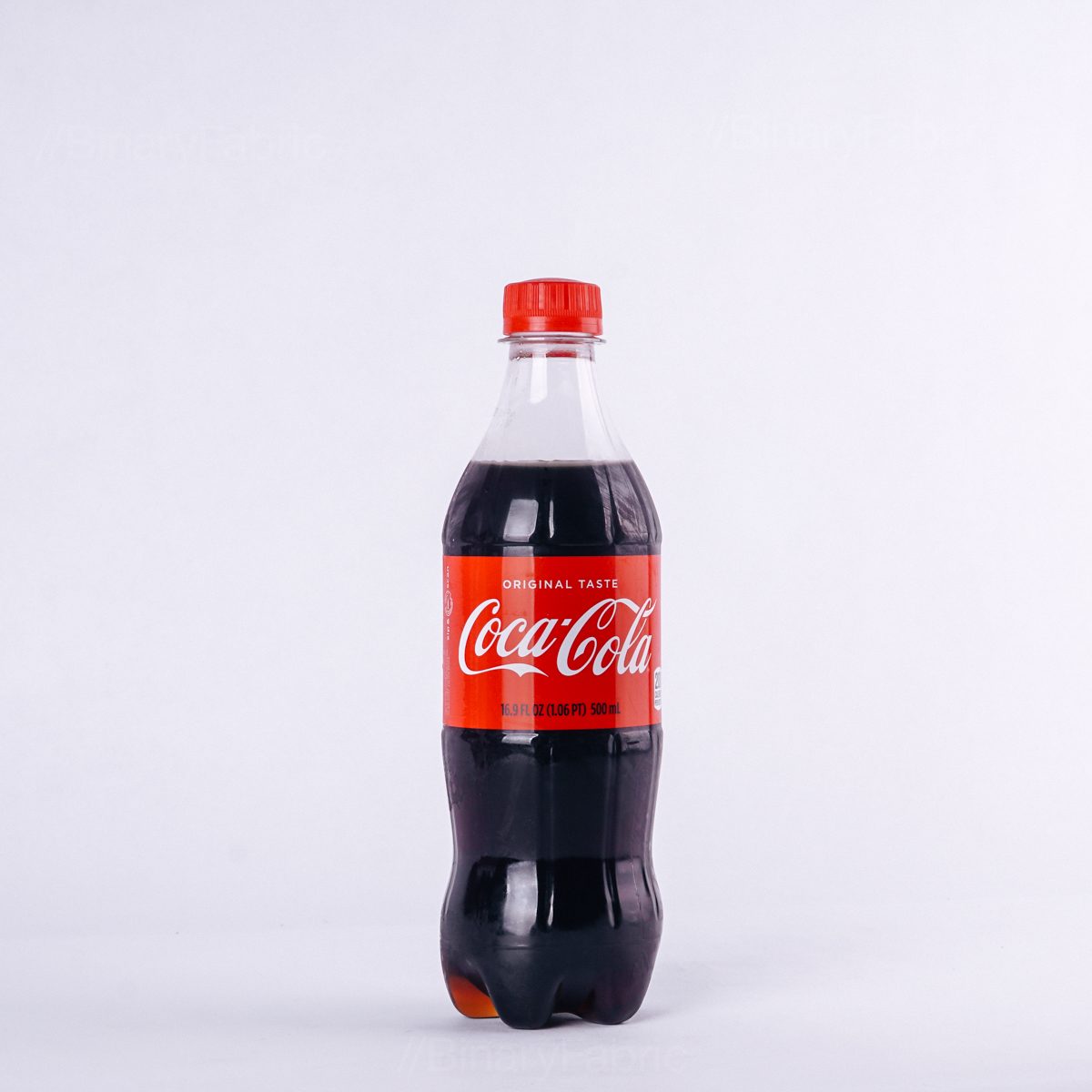 Order 16 oz Bottle of Coke food online from Grizzly Grilled Cheese store, New York on bringmethat.com