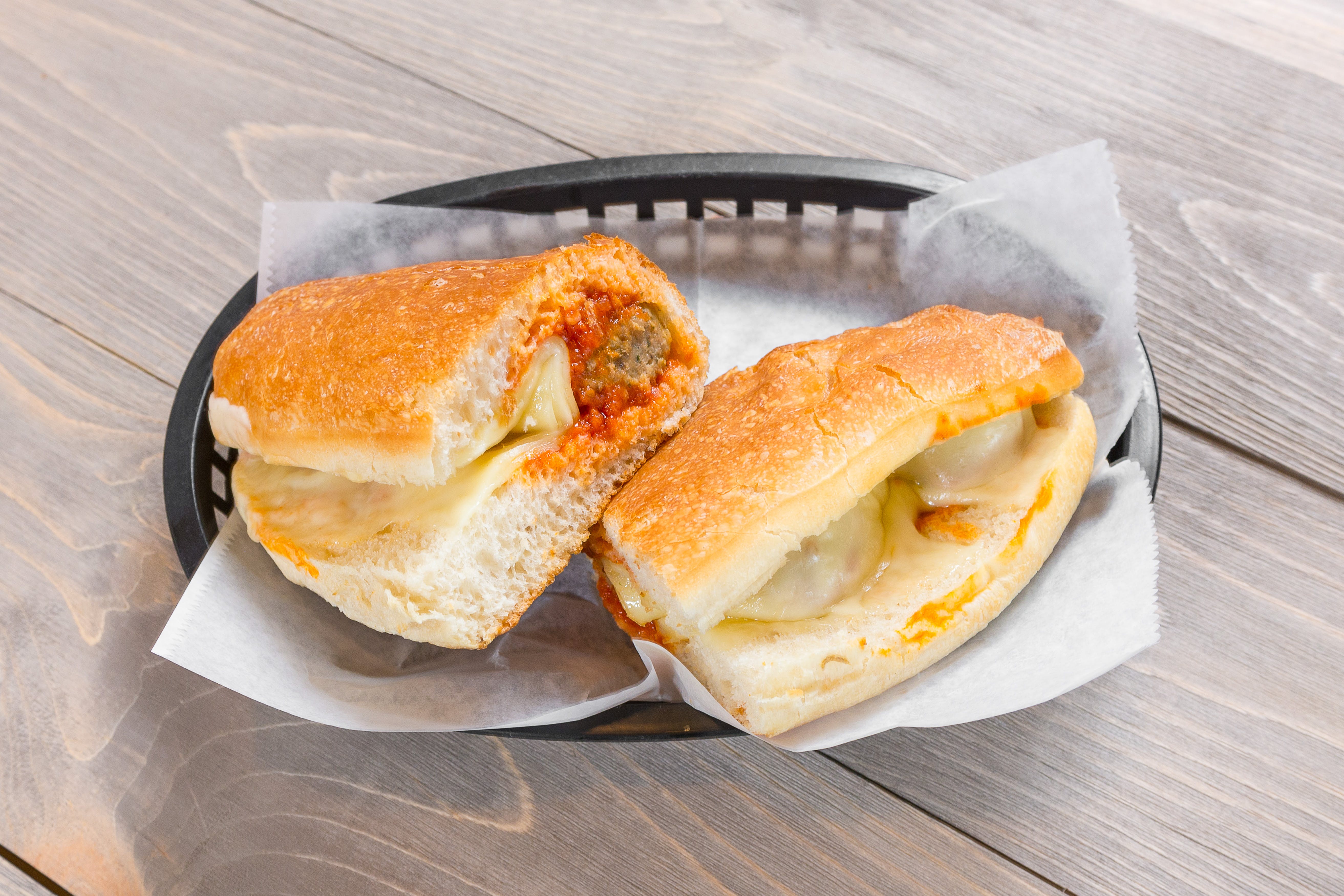 Order Meatball Grinder - Large food online from Carlo's Italian Restaurant store, Reading on bringmethat.com