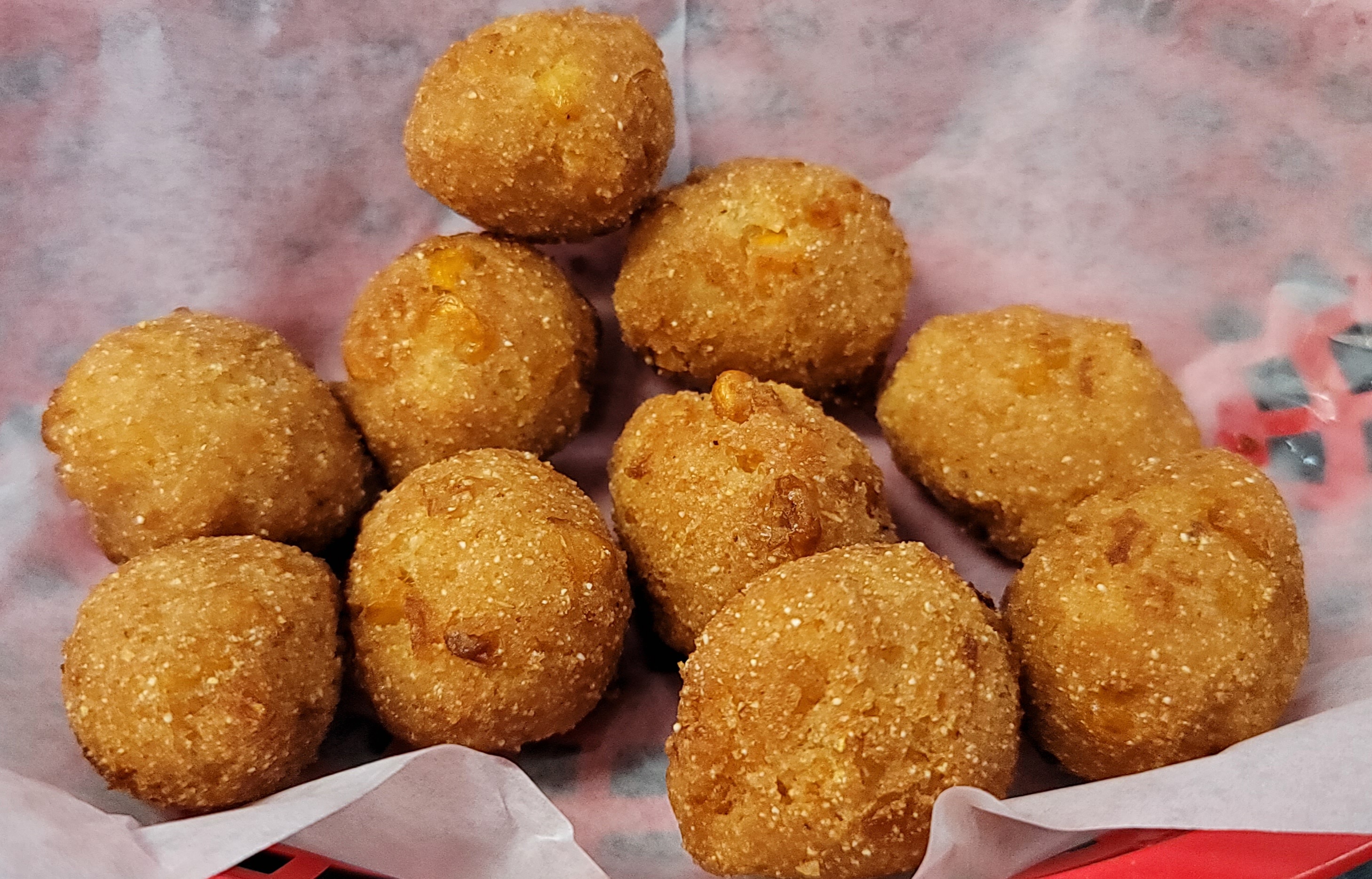 Order A1. Hushpuppies food online from La Juicy Seafood store, St. Louis on bringmethat.com