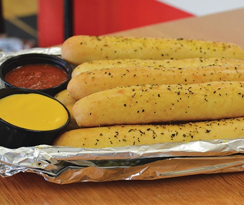 Order Large Breadsticks food online from Swing In Pizza store, Bloomington on bringmethat.com