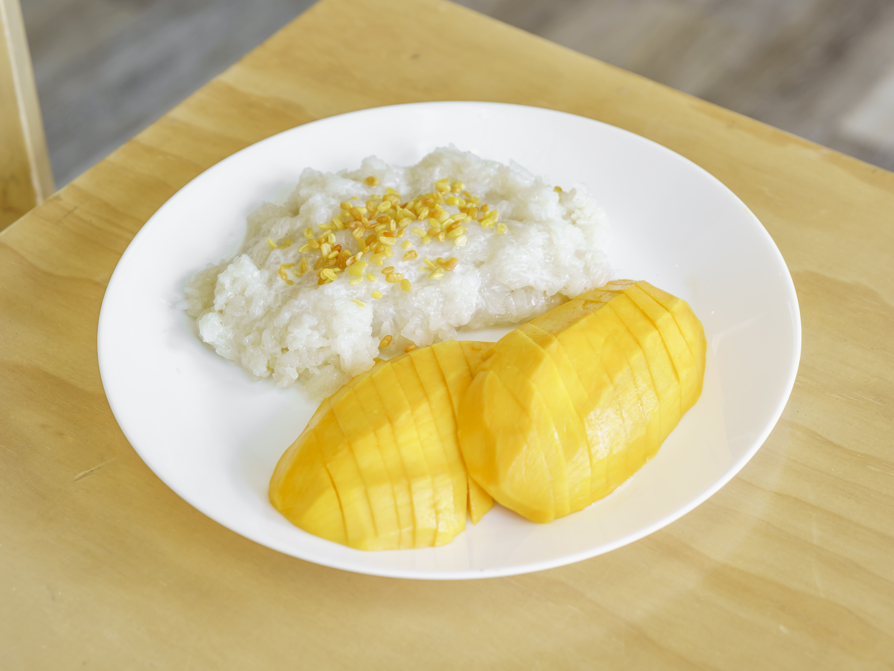 Order Mango sticky rice food online from Owl Owl Thai Lao Street Food store, Signal Hill on bringmethat.com