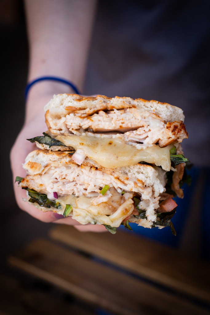 Order Turkey Basil Panini food online from The Flinderstreet Cafe store, Chino on bringmethat.com