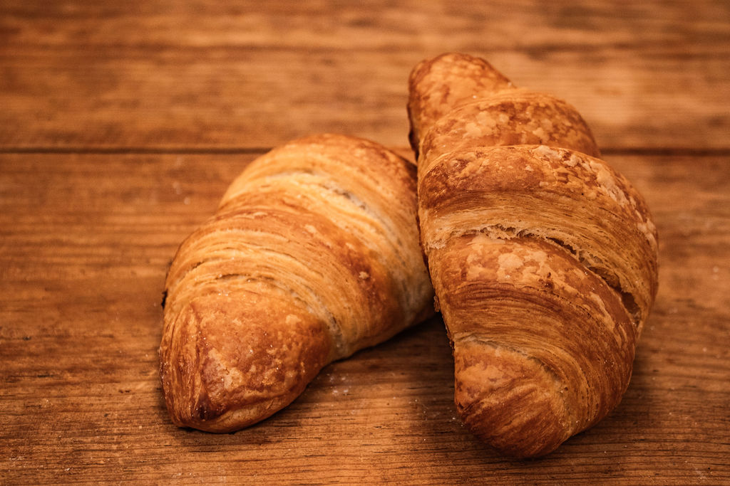 Order Croissant food online from New World Bakery store, Kyle on bringmethat.com