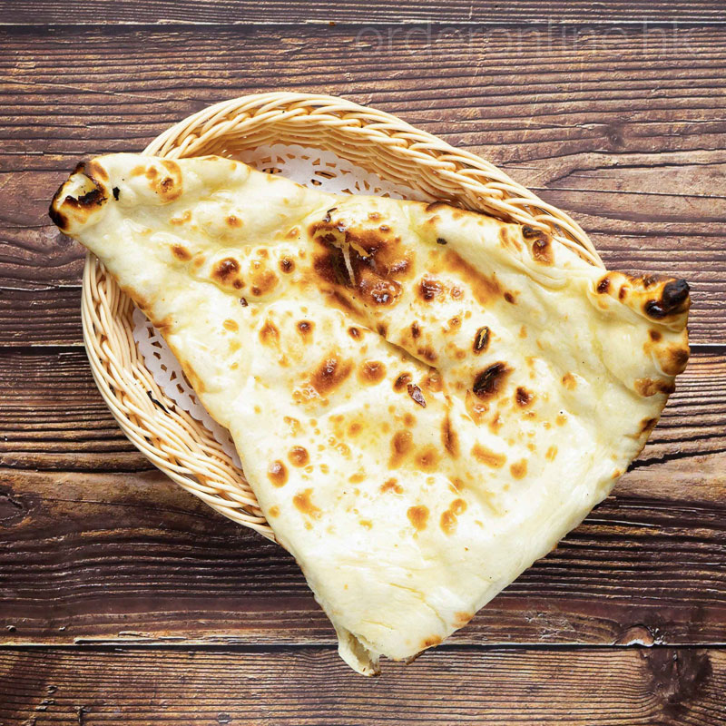 Order 330. Butter Naan food online from 9 Spices Ballantyne store, Charlotte on bringmethat.com