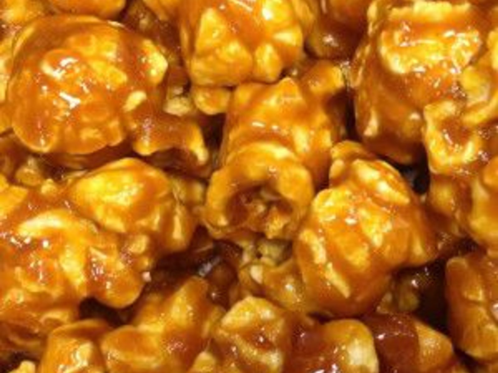 Order BUTTER CRUNCH food online from Poparazzis Popcorn store, Houston on bringmethat.com