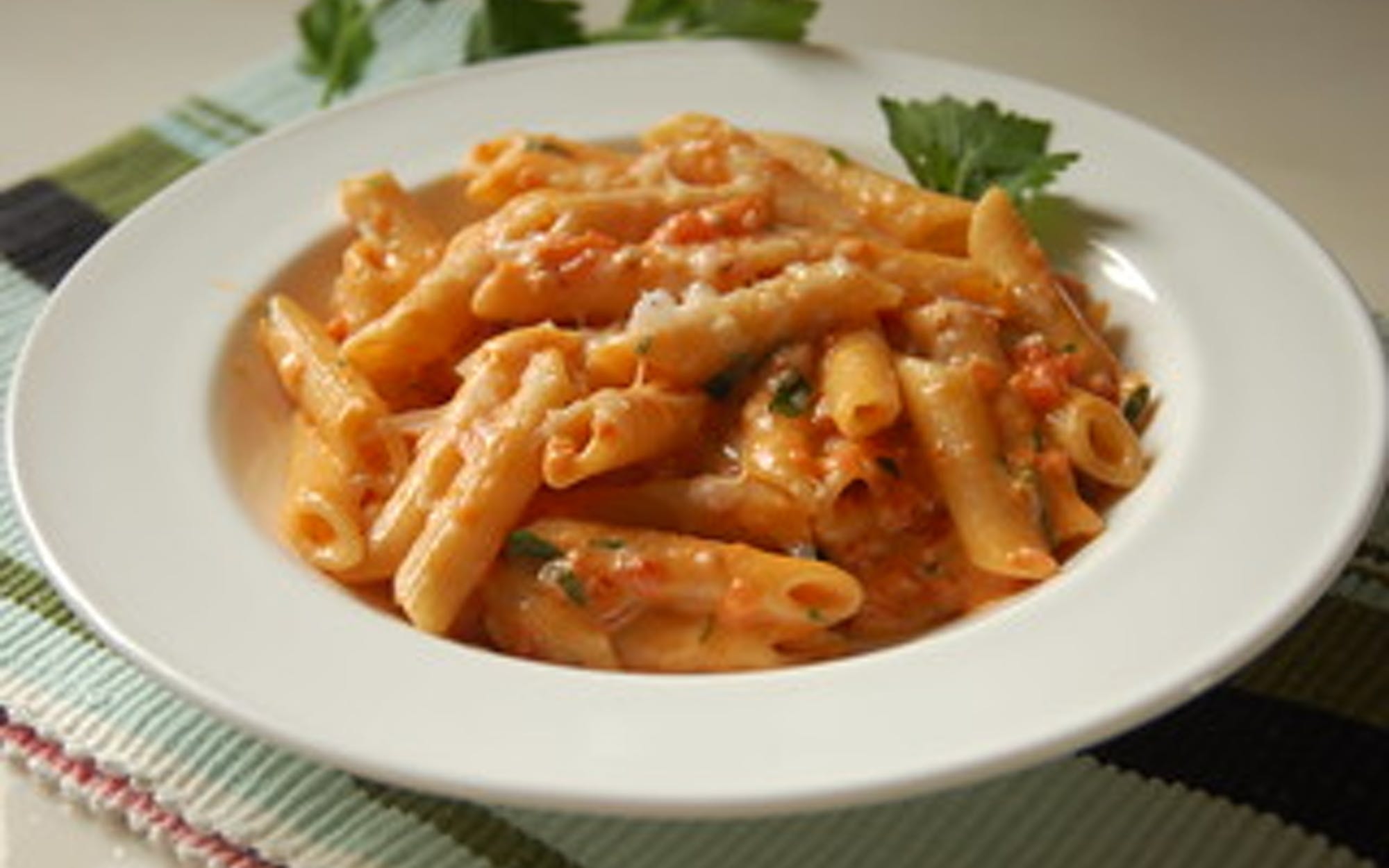 Order Penne Alla Vodka - Pasta food online from Pino's Pizzeria store, Easton on bringmethat.com