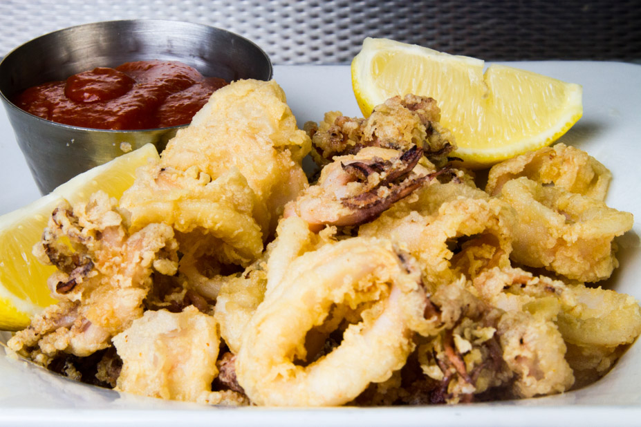 Order Grand Fried Calamari food online from Moonstruck Eatery store, New York on bringmethat.com