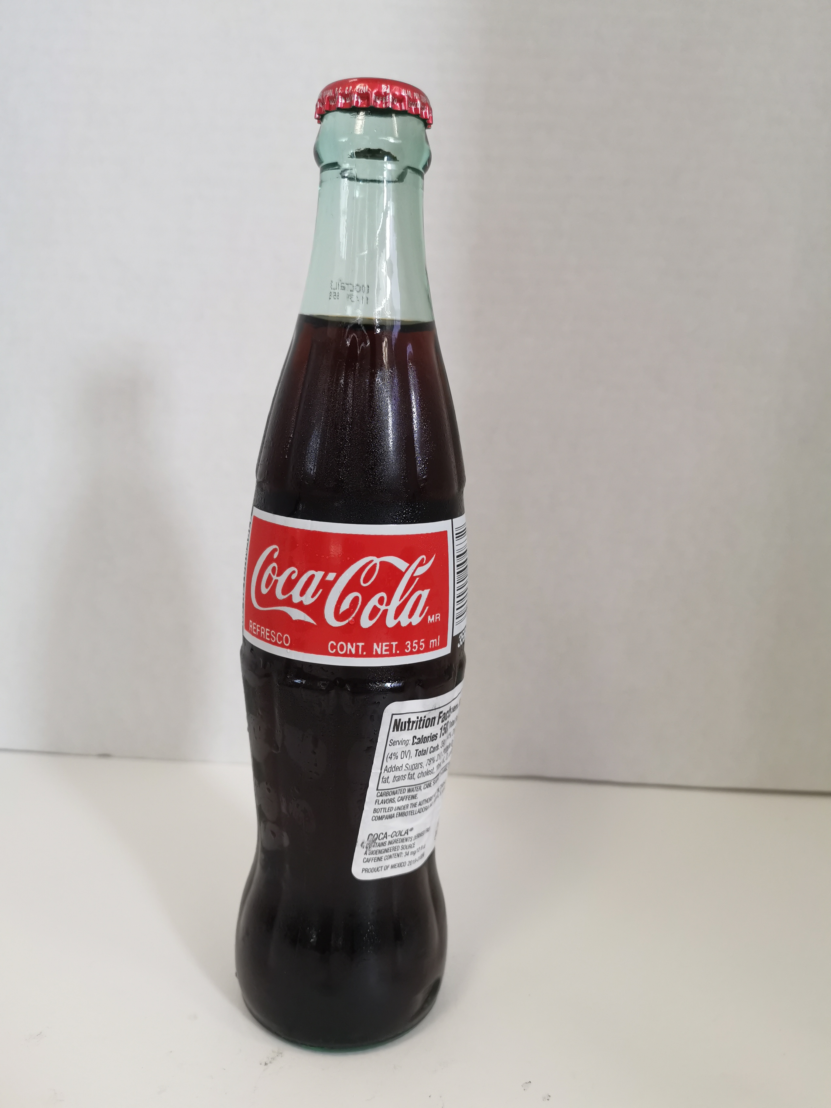 Order Coke Mexican 355ml food online from Rank Quickserve store, San Francisco on bringmethat.com