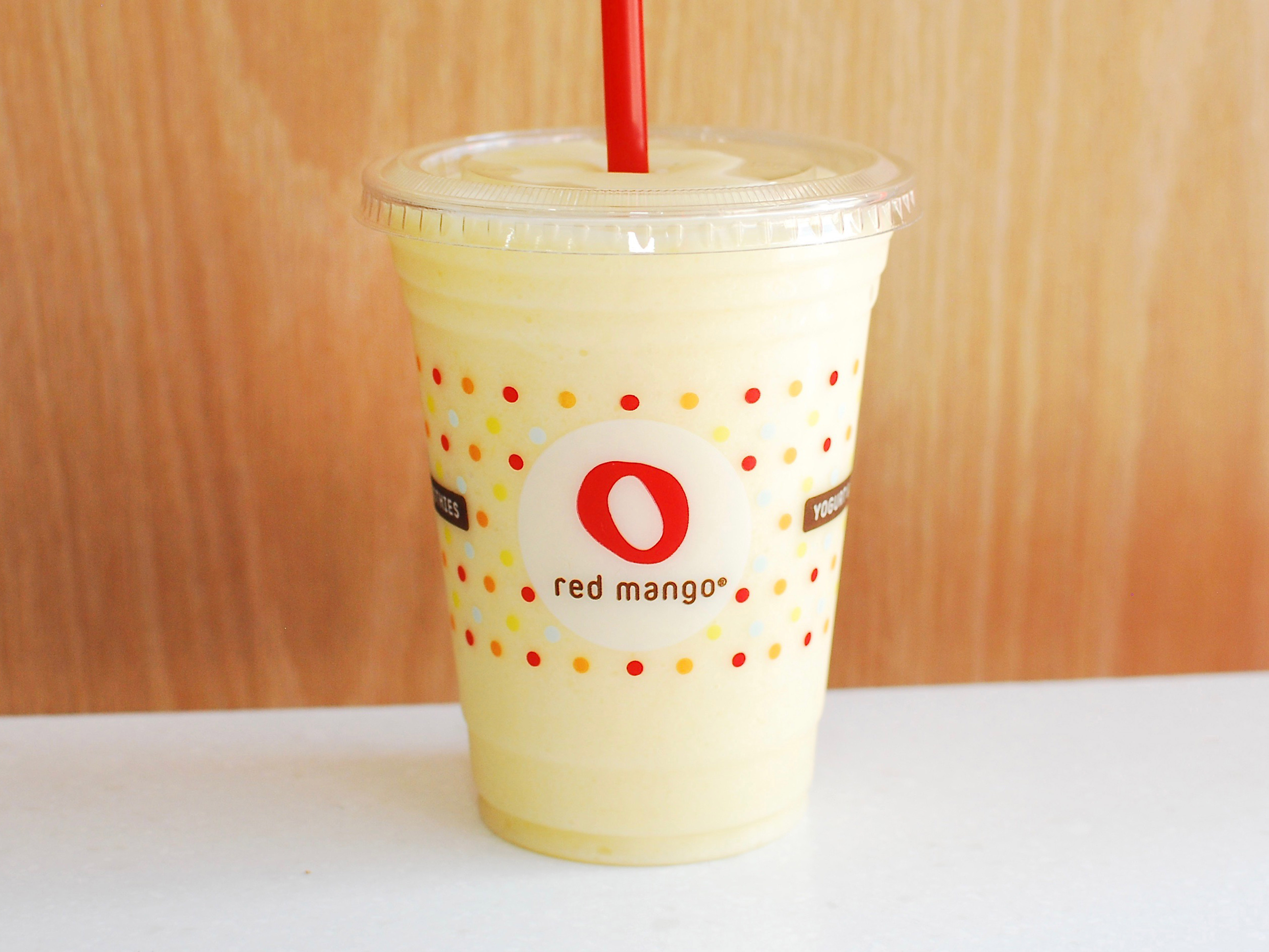 Order Tropical Mango Smoothie food online from Red Mango store, Frisco on bringmethat.com
