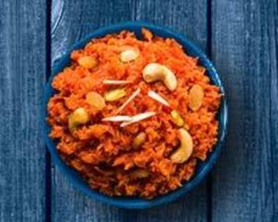Order Carrot Pudding  food online from Mad Over Curry store, Buffalo on bringmethat.com