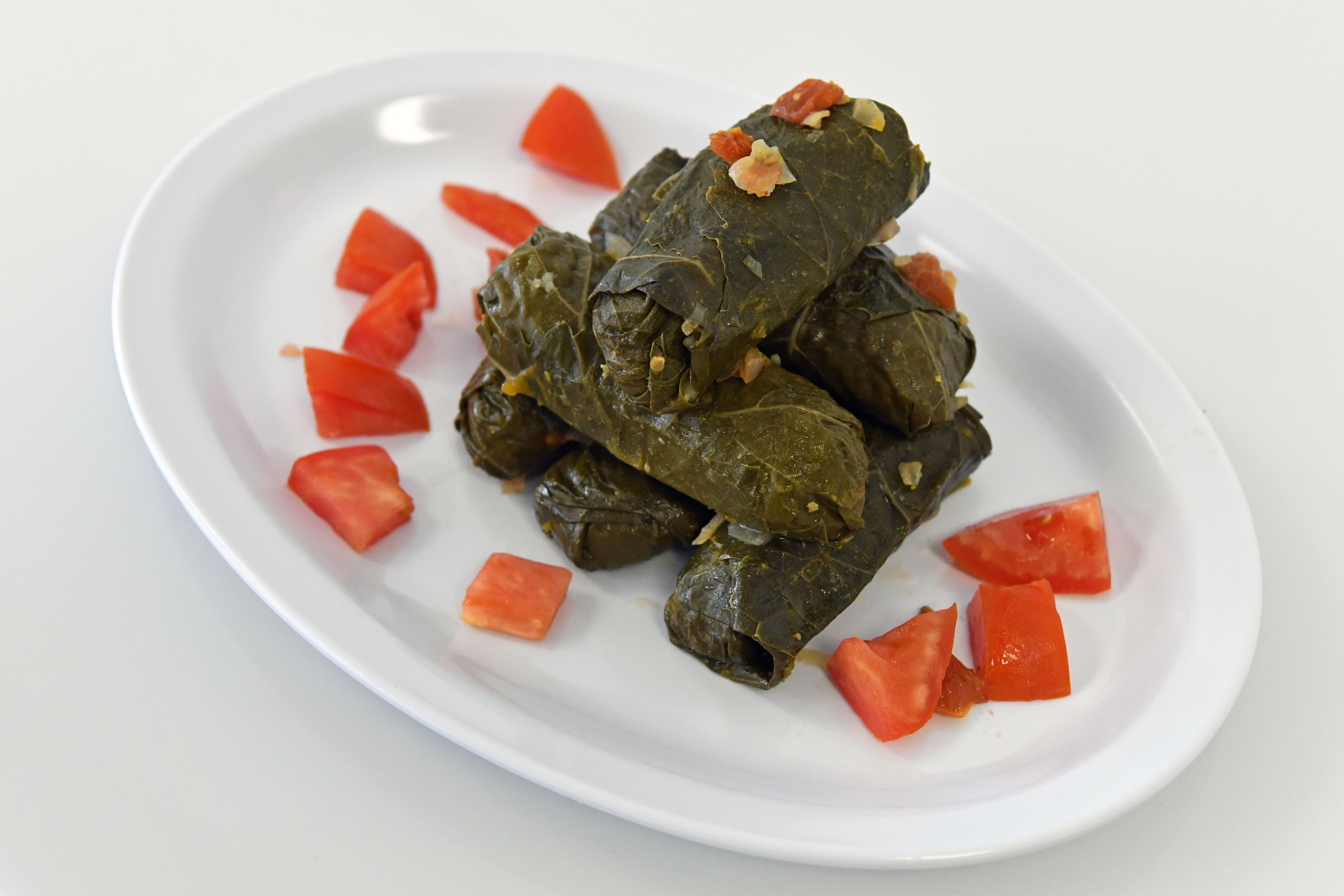 Order 3 Pieces Dolmades food online from Your Greek Cousin store, West Palm Beach on bringmethat.com