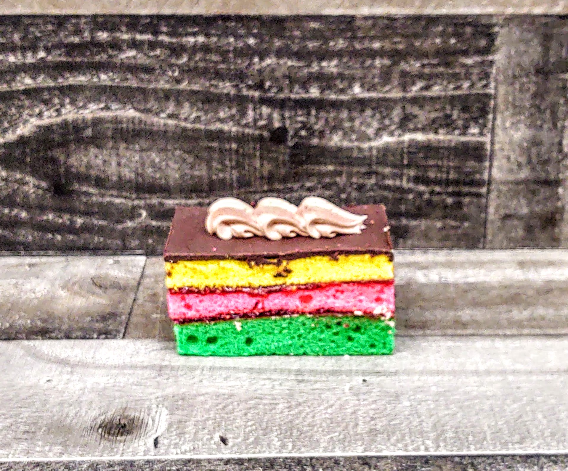 Order 7 Layer Rainbow Cookie Cake Slice food online from Normandie Bakery store, Hazlet on bringmethat.com