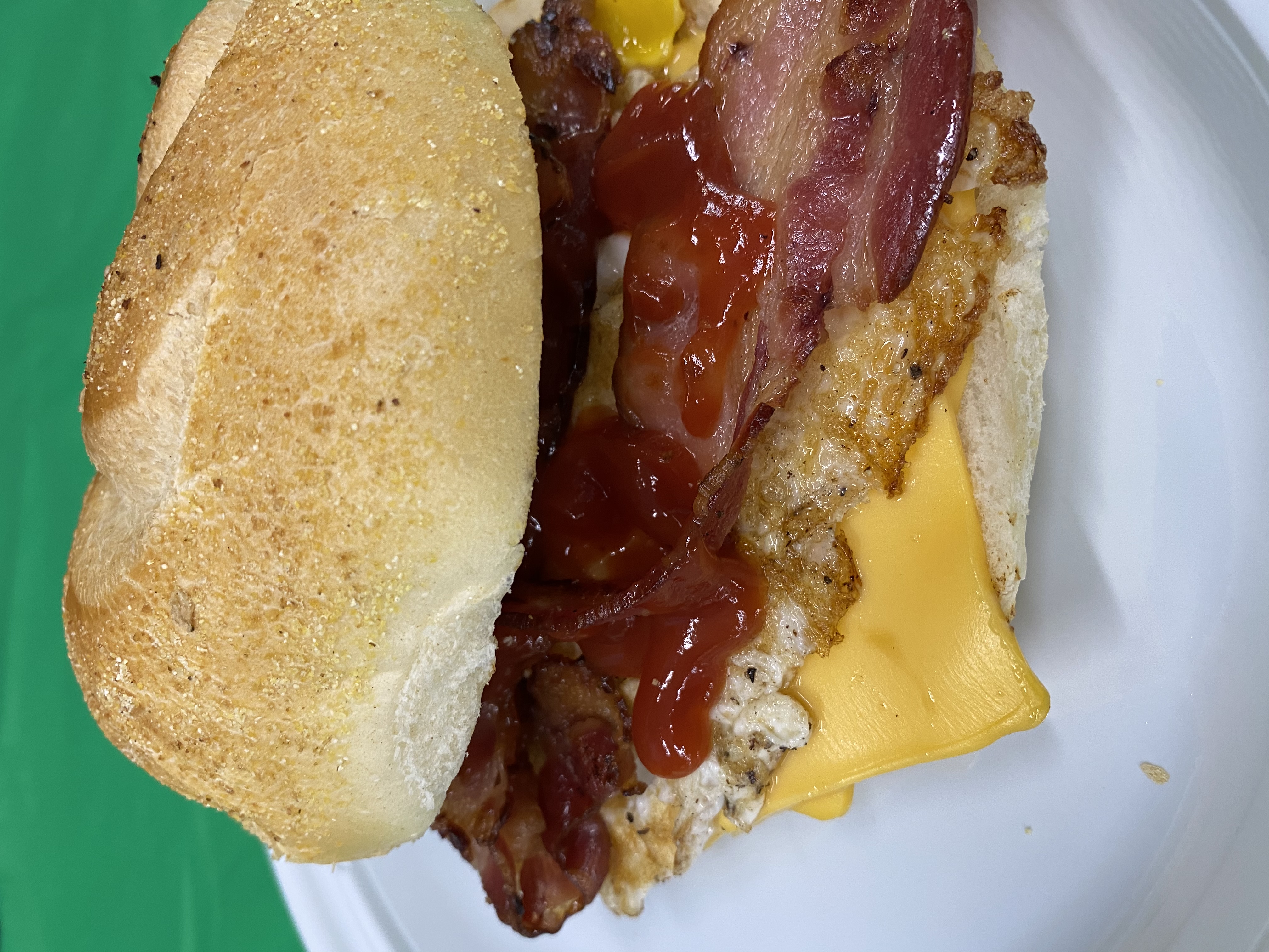 Order Bacon with Egg and Cheese Breakfast Sandwich food online from Los Latinos Deli store, Long Beach on bringmethat.com