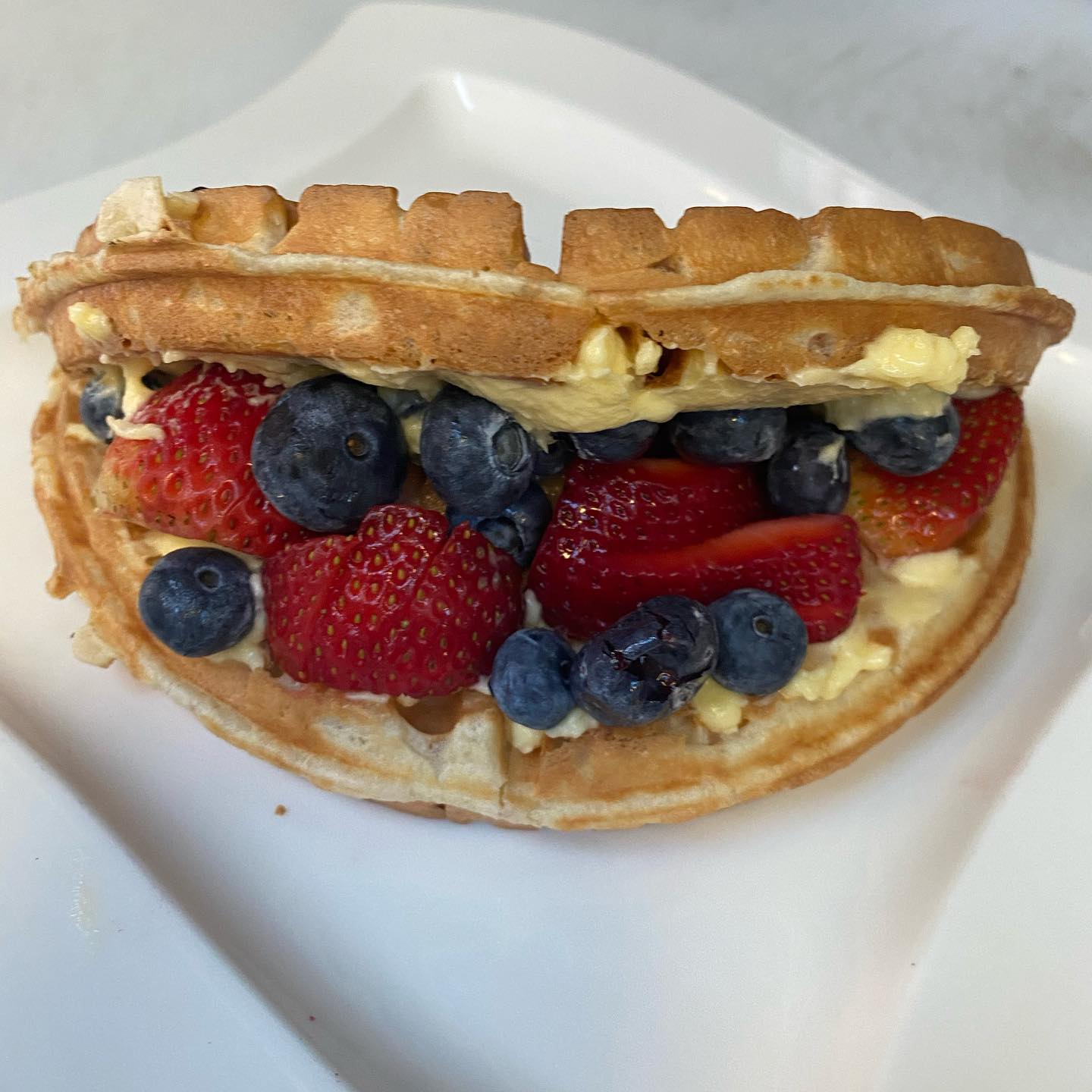 Order  Cheesecake and Berries Waffle food online from Ginas Crepes And Waffles store, Santa Ana on bringmethat.com