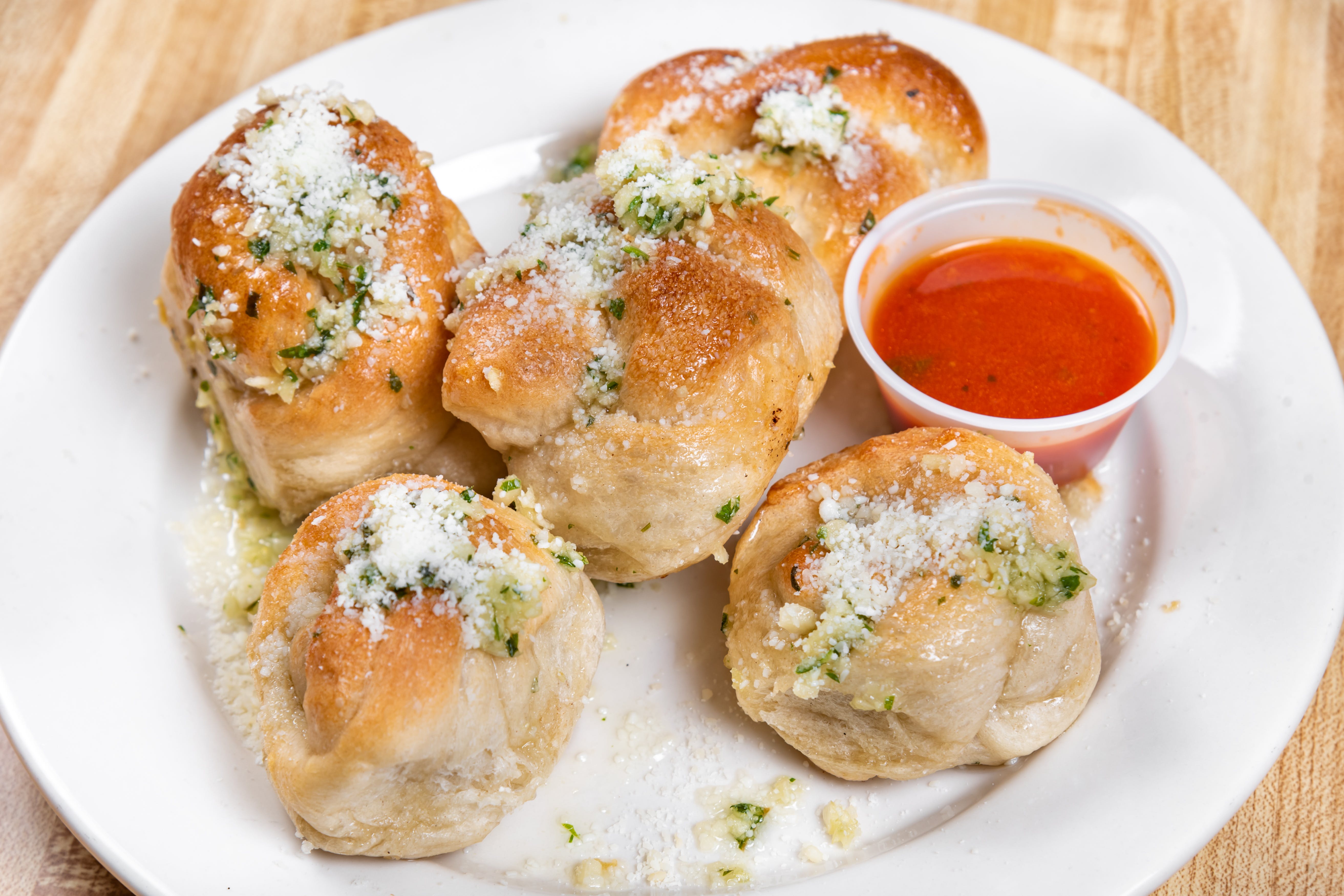 Order Garlic Knots - 5 Pieces food online from Steinway pizza store, Astoria on bringmethat.com