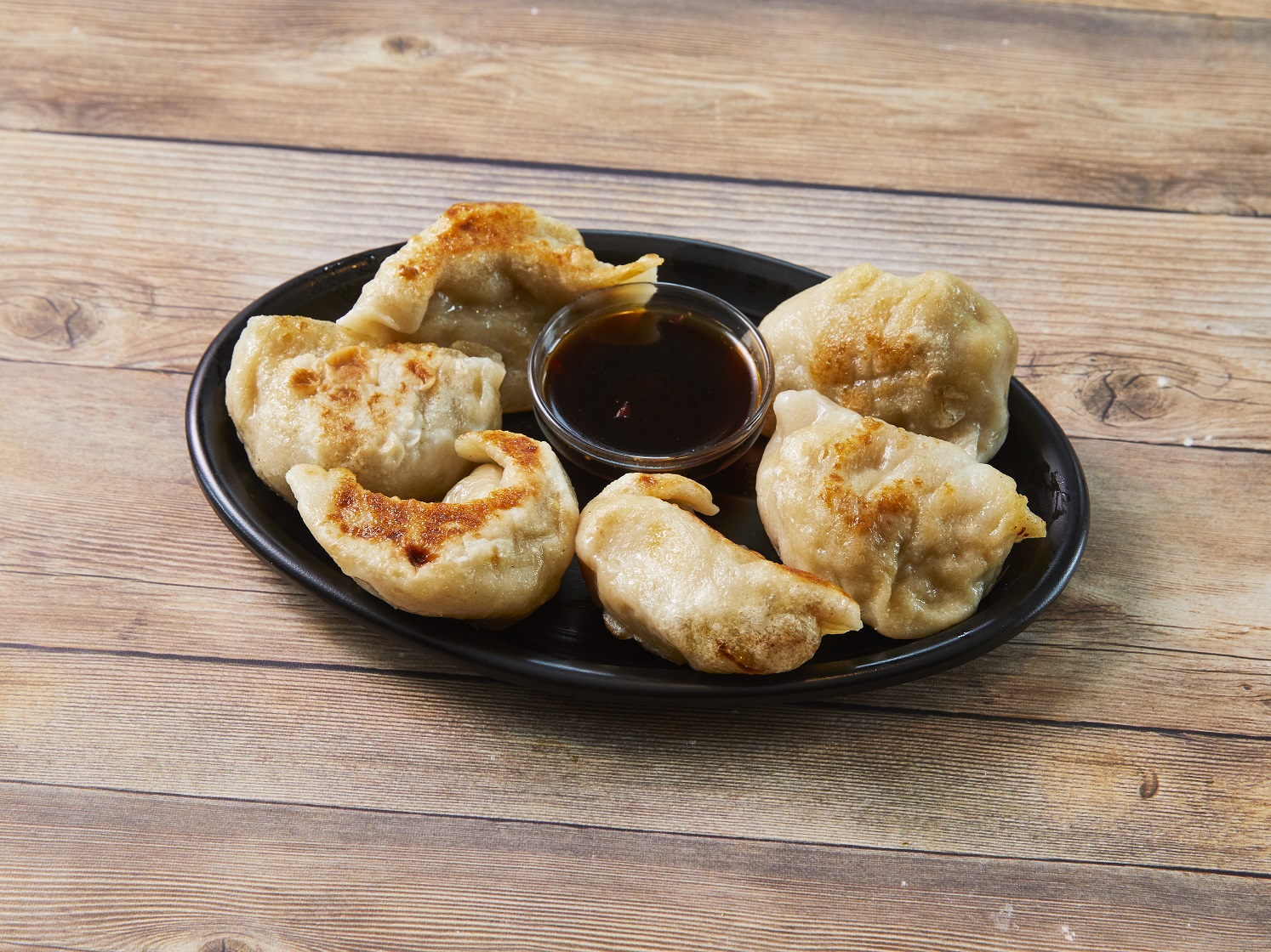 Order Pot Stickers Appetizer food online from China Chop Suey store, Oak Park on bringmethat.com