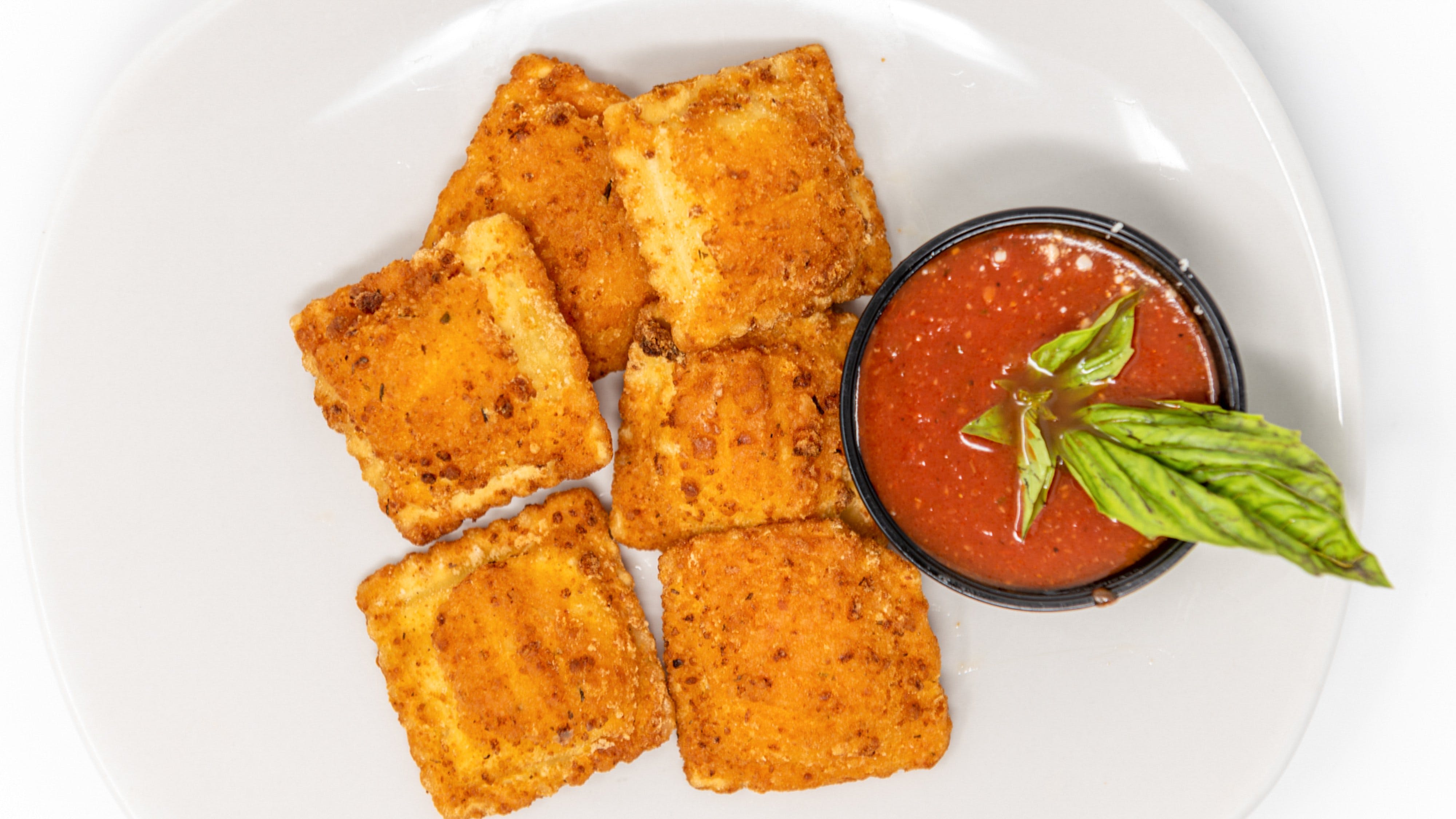 Order Fried Cheese Ravioli - Appetizers food online from I Love Ny Pizza Of Woodstock store, Woodstock on bringmethat.com