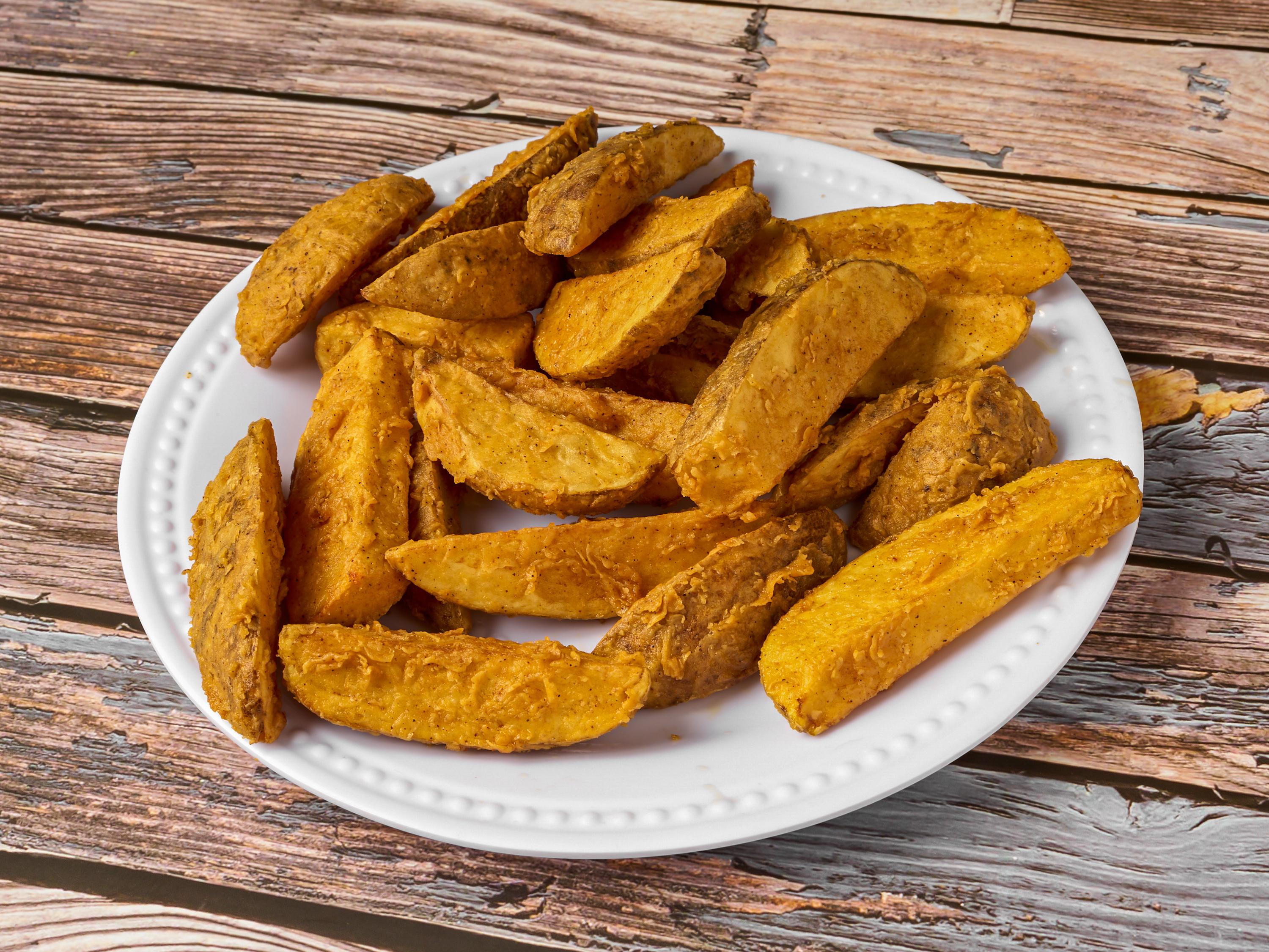 Order Potato Wedges (4) food online from Chester Chicken store, La Porte on bringmethat.com
