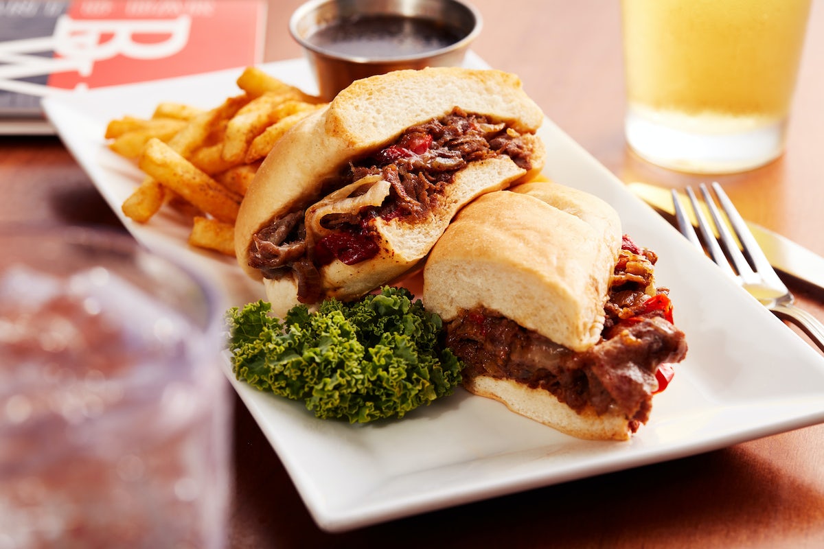 Order PHILLY CHEESE STEAK food online from Big Whiskey's American Restaurant & Bar store, Springfield on bringmethat.com