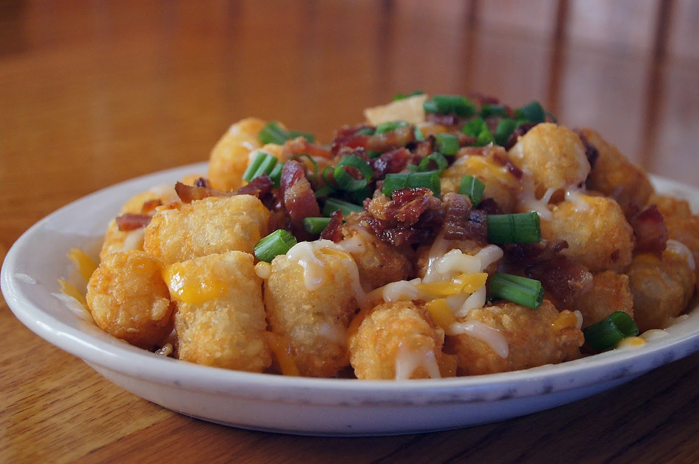 Order Loaded Tater Tots food online from Black Eyed Pea store, Englewood on bringmethat.com