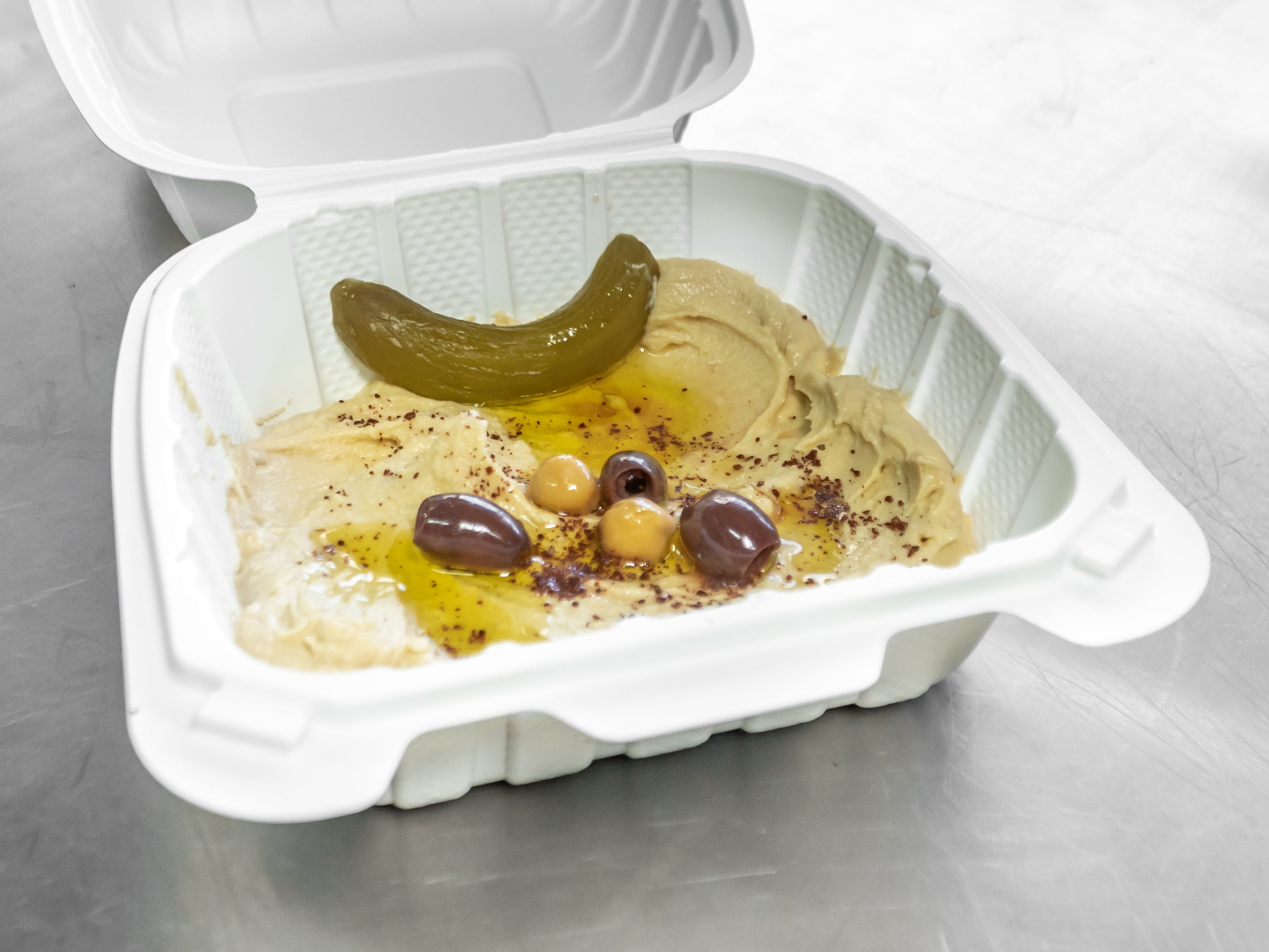 Order Hummus Dip with Pita food online from Pita On The Plaza store, Bethesda on bringmethat.com