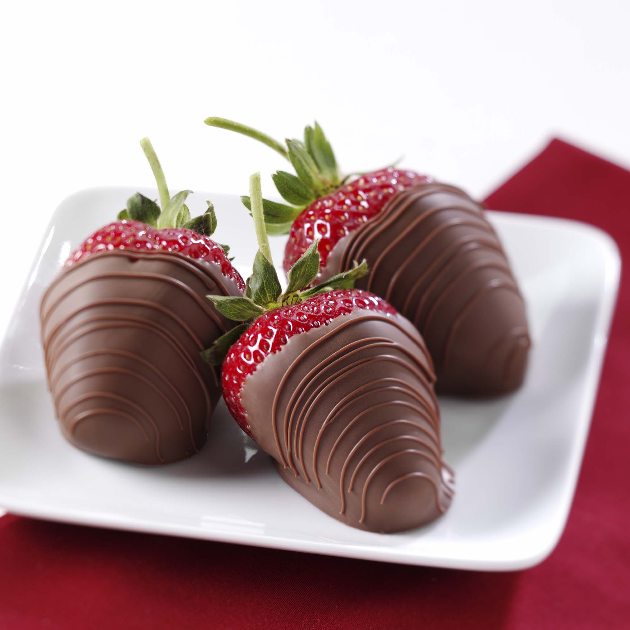 Order Milk Chocolate Covered Strawberries food online from Russell Stover Chocolates store, Omaha on bringmethat.com