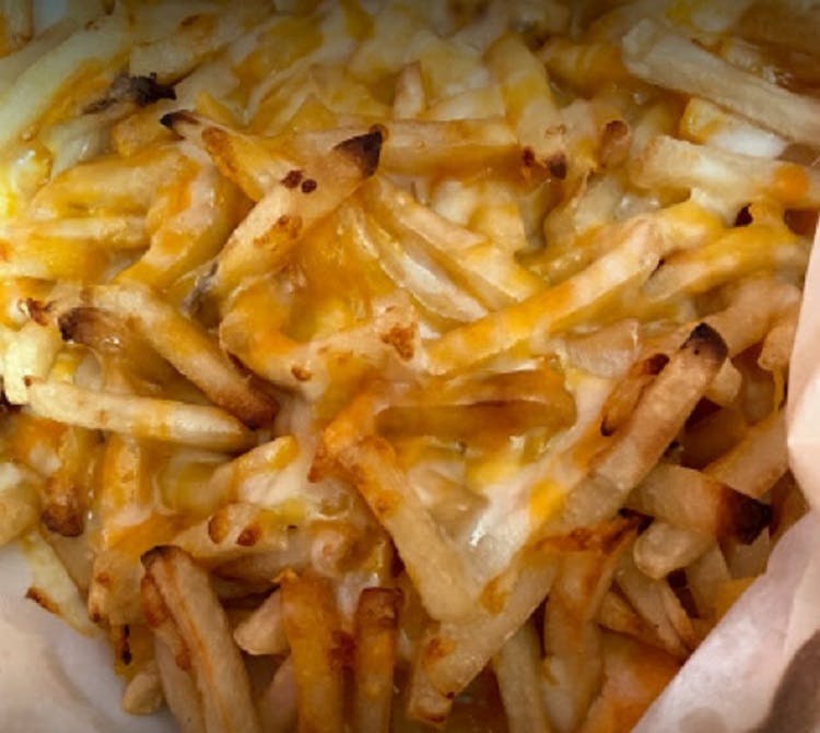 Order Cheesy Fries - Appetizer food online from Brown Jug store, Chelsea on bringmethat.com
