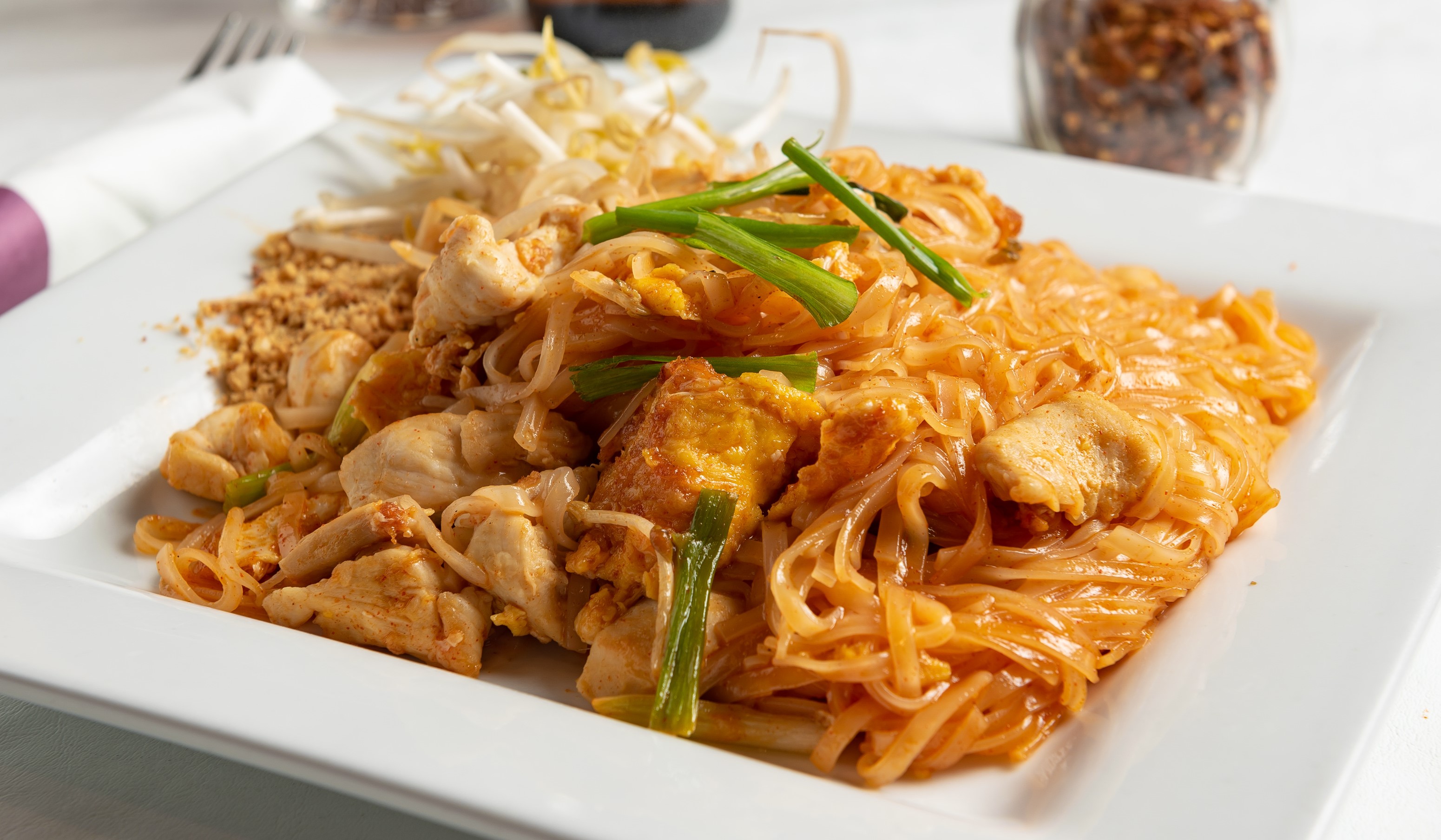 Order Pad Thai Chicken food online from Phuket Thai Restaurant and Sushi store, Huntsville on bringmethat.com