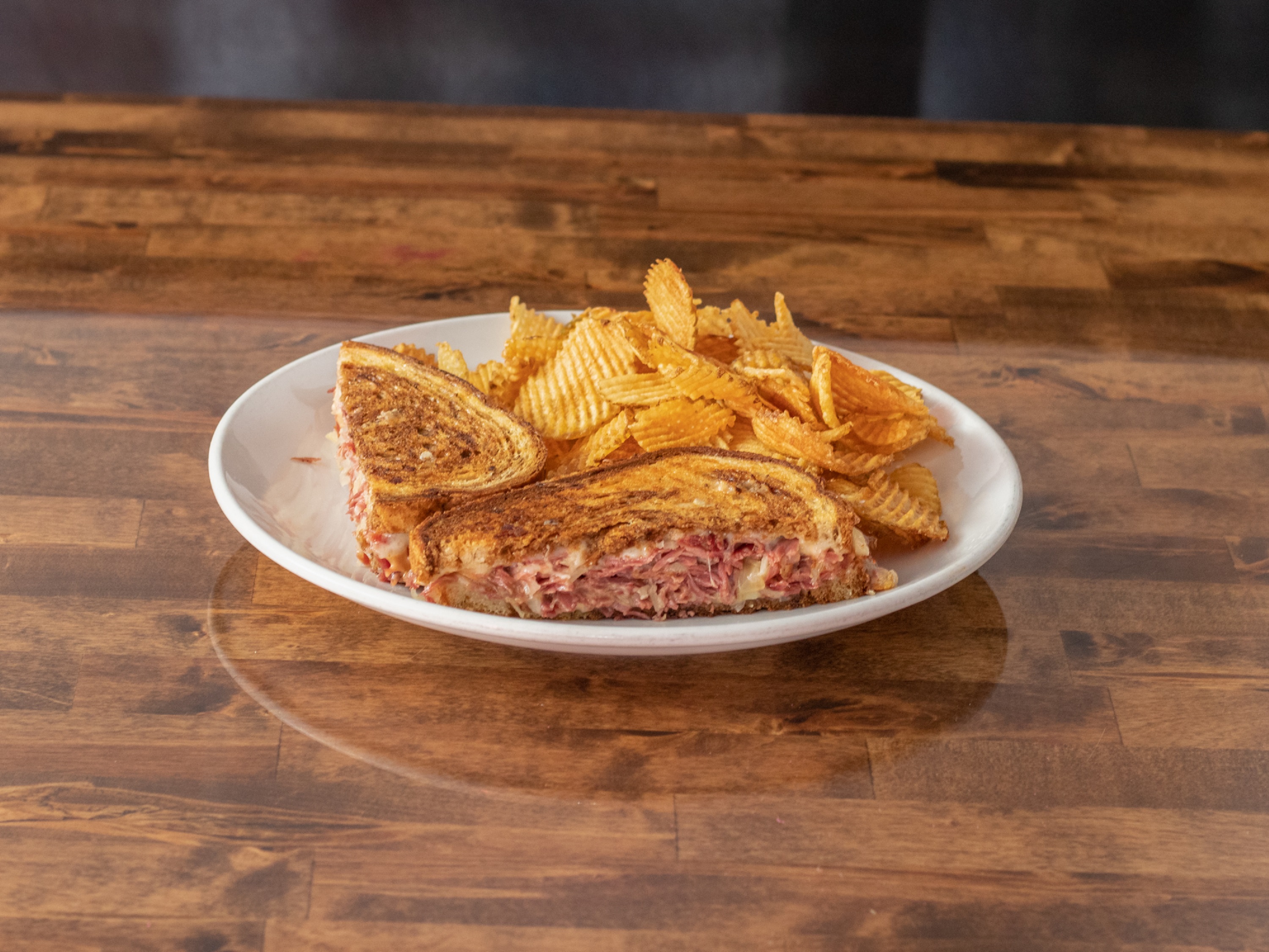 Order Rueben Panini food online from Louie Tap House store, Roscoe on bringmethat.com