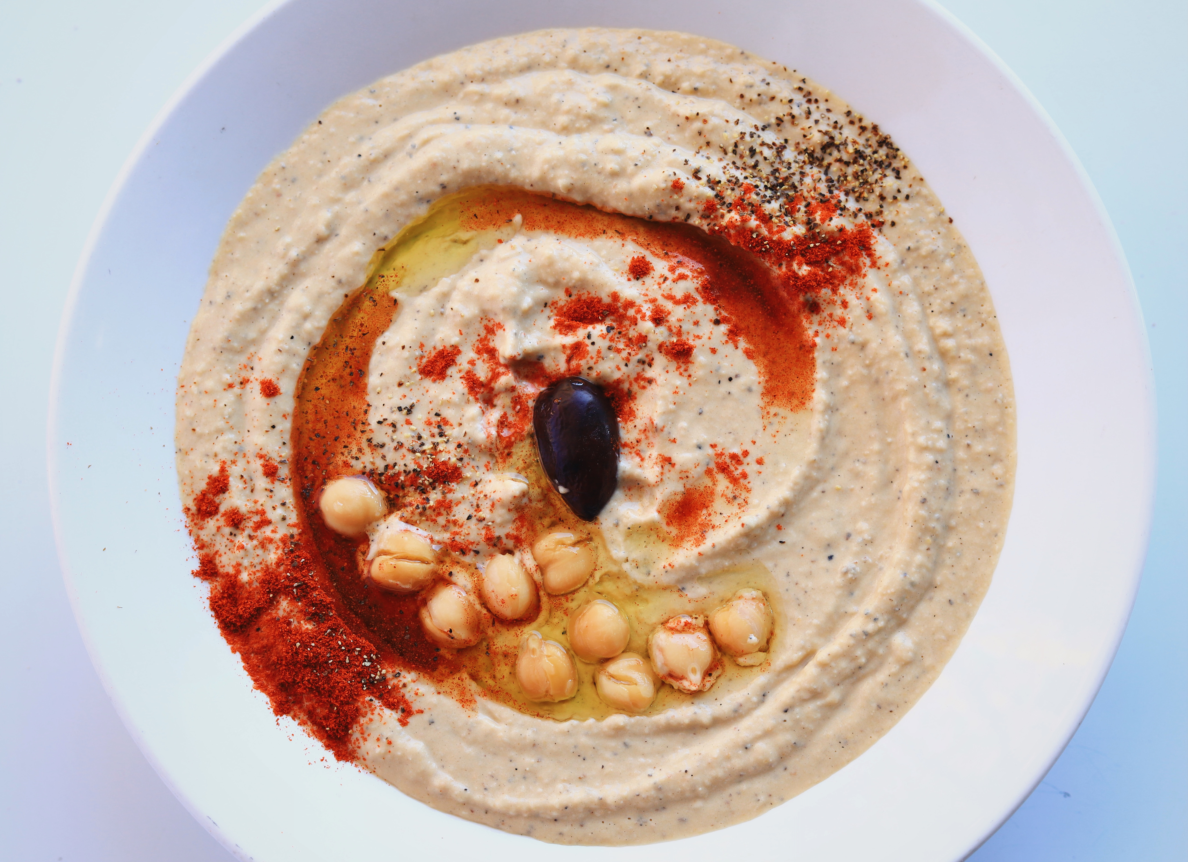 Order Hummus food online from Grill House Cafe store, San Diego on bringmethat.com