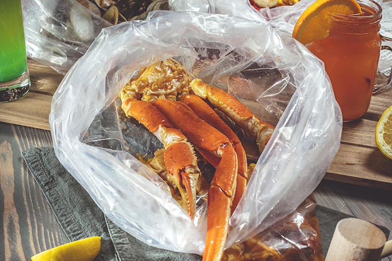 Order 1 lb. Snow Crab Legs Boil food online from Holy Crab Cajun store, White Plains on bringmethat.com