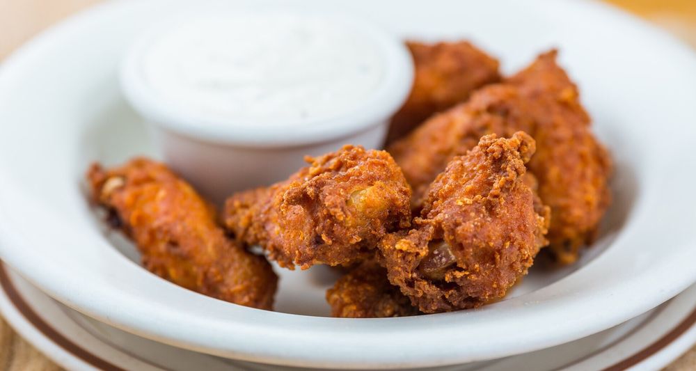 Order Spicy Buffalo Wings food online from Haystack Pizza Restaurant-Pick-Up & Delivery store, San Francisco on bringmethat.com