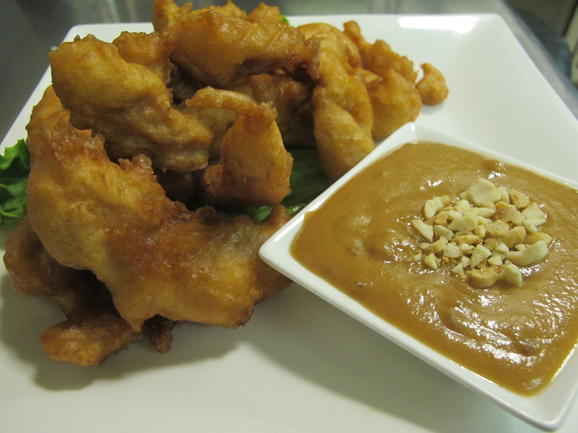 Order 15. Peanut Chicken food online from Thailand Restaurant store, Modesto on bringmethat.com