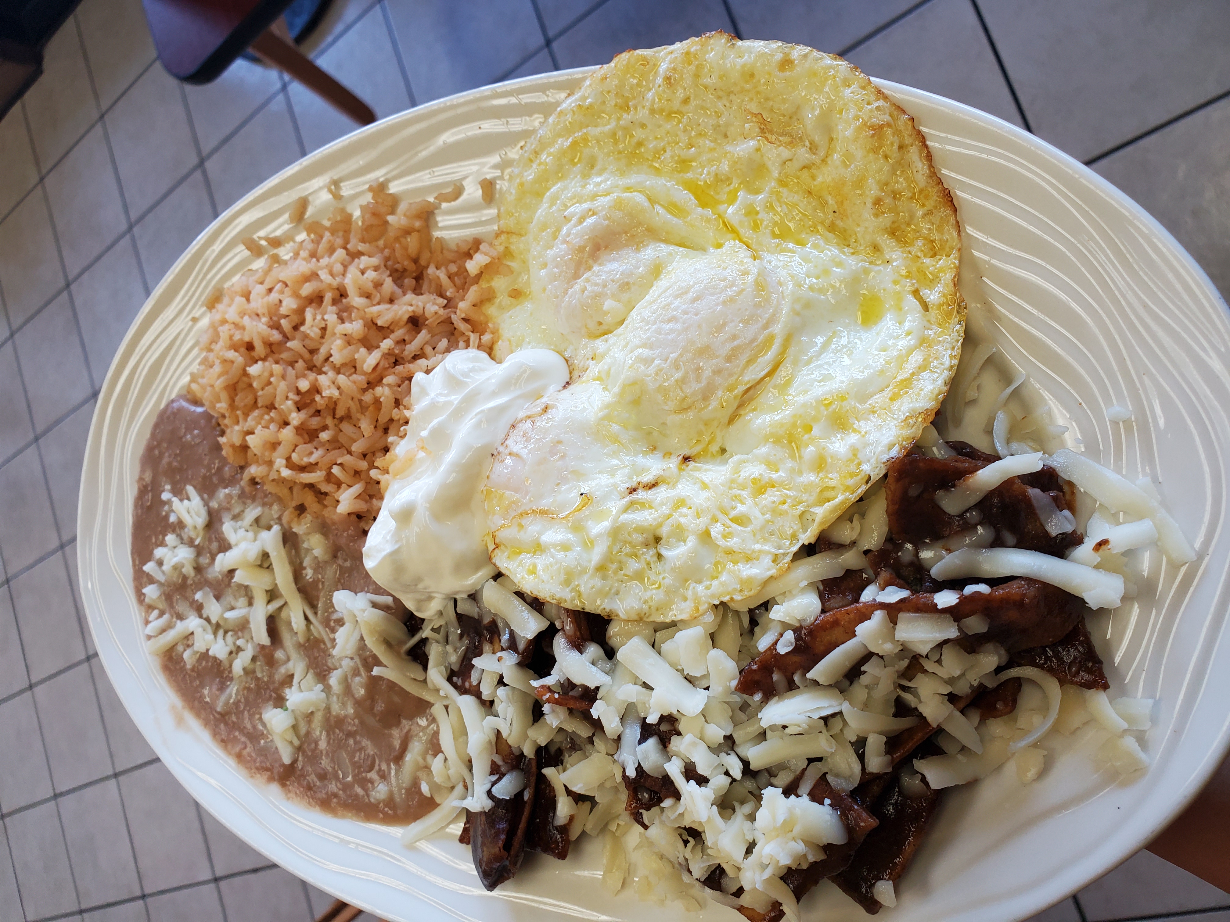 Order Chilaquiles en Mole food online from Los Chilitos Restaurant store, South El Monte on bringmethat.com