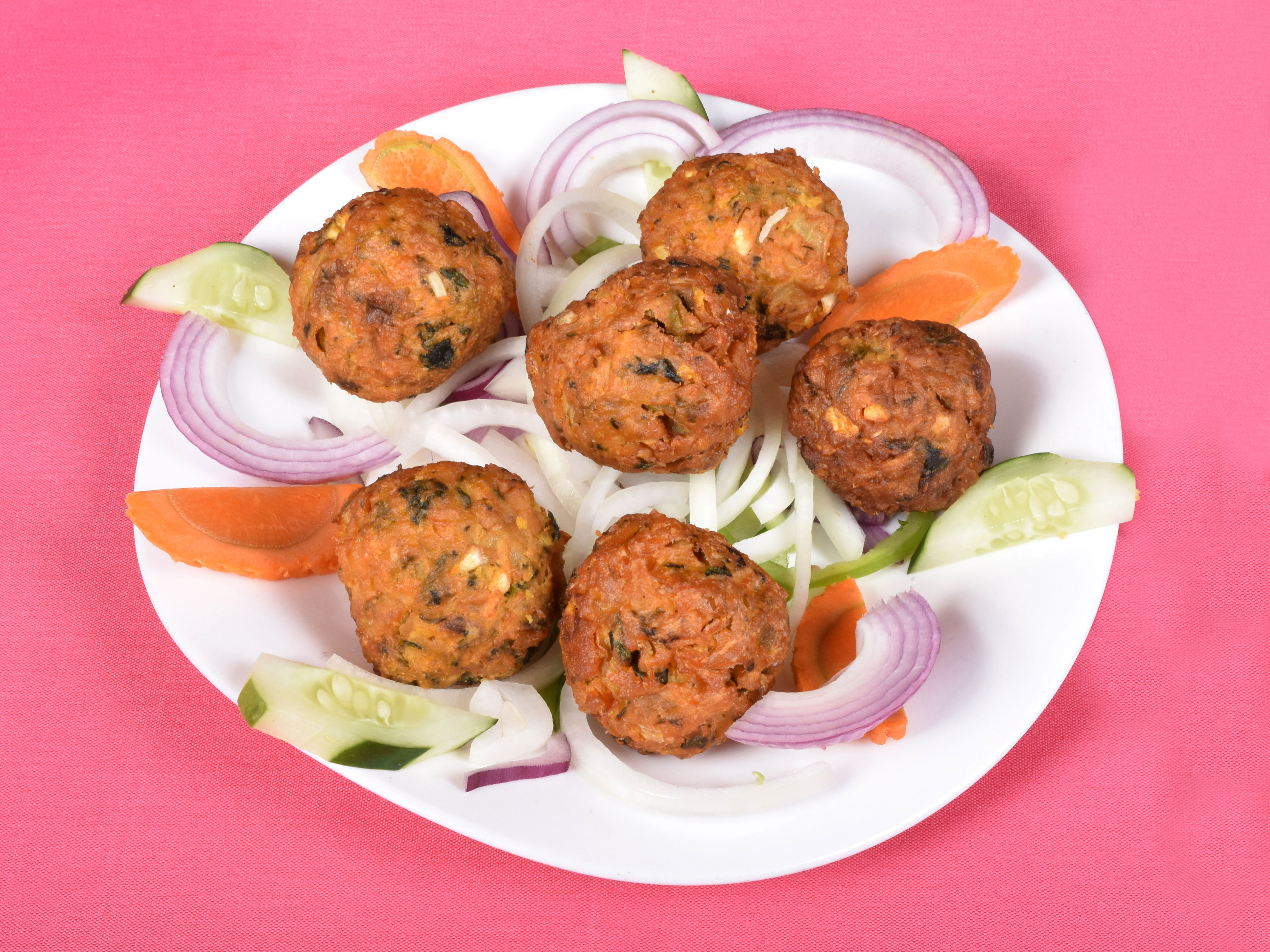 Order Bhajia food online from Mughal Palace store, Valhalla on bringmethat.com