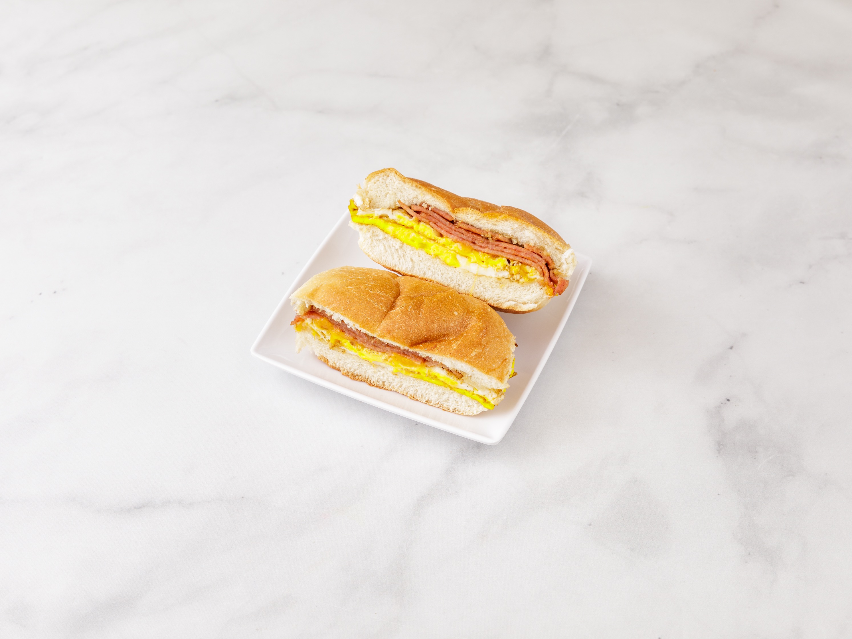 Order Taylor Ham, Egg and Cheese Breakfast Sandwich food online from Danatoni's Grill and Deli store, South Hackensack on bringmethat.com