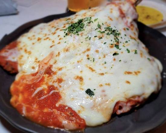 Order Veal Chop Parmigiana food online from Grano Pizzeria & Italian Tavern store, Scotch Plains on bringmethat.com