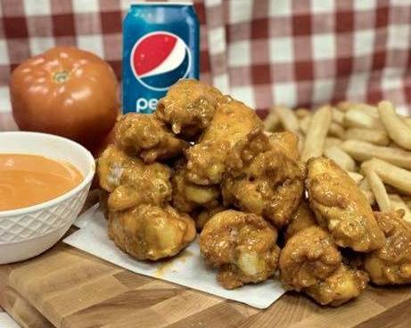 Order 7pc Buffalo Wings and a 12oz Pepsi Product food online from Katsouprini Pizza Squared store, Washington on bringmethat.com