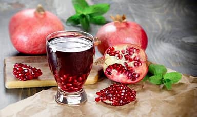 Order Pomegranate Juice food online from Cosmos Indian Store & Cafe store, Lawrence on bringmethat.com
