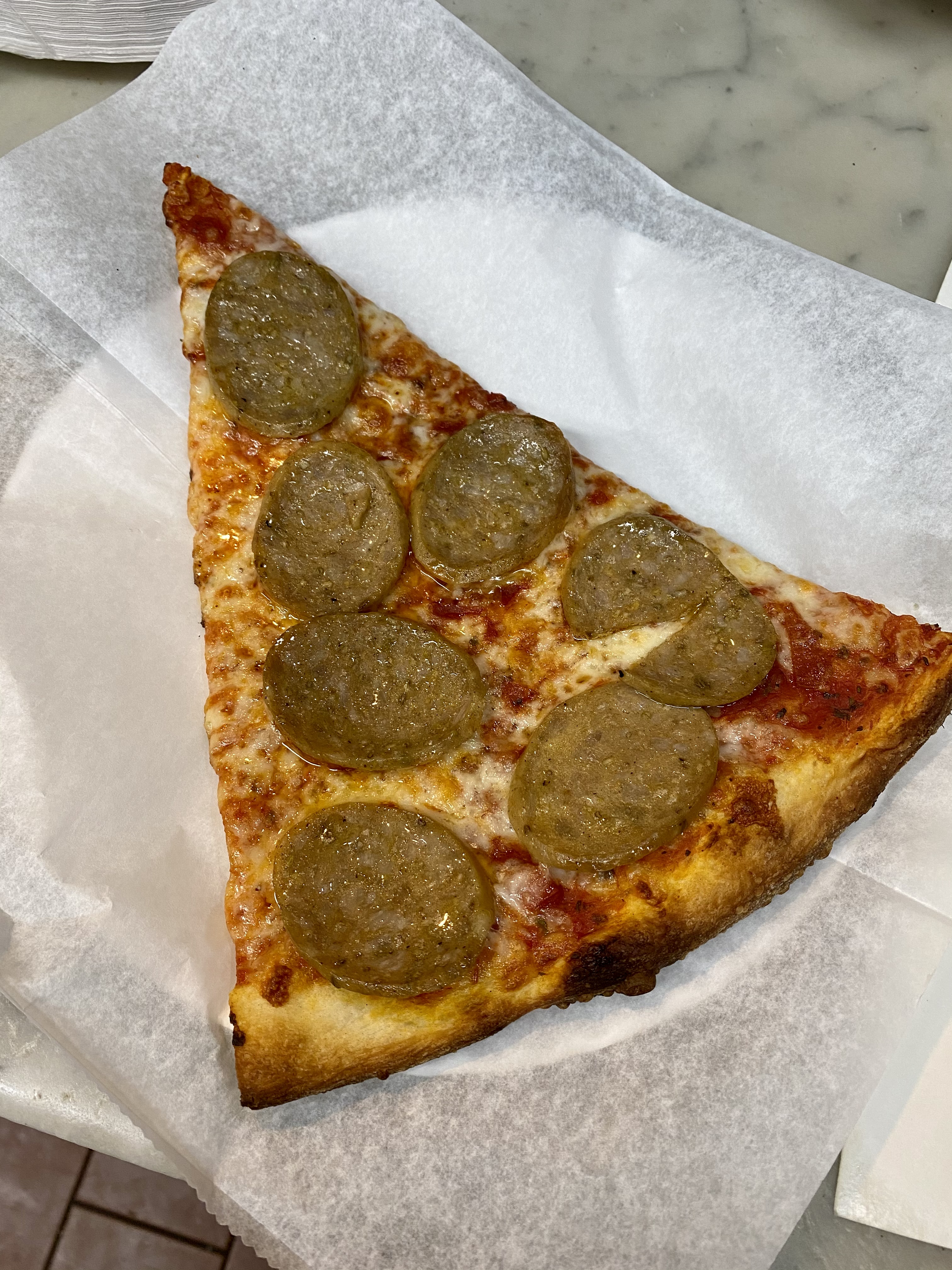 Order Sausage Slice food online from Vinny's Pizzeria store, Corona on bringmethat.com