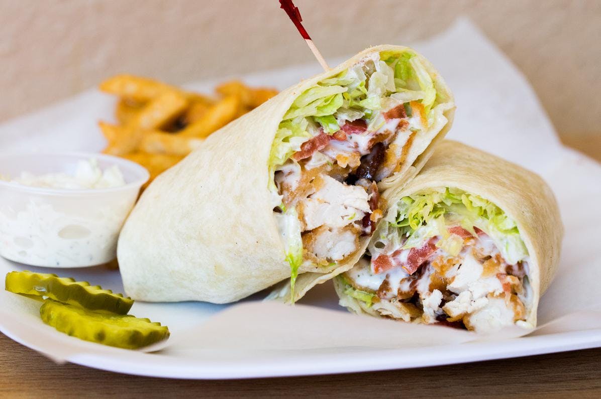 Order Crispy Chicken Ranch Wrap - Wrap food online from Nonna Rosa Pizzeria store, Norristown on bringmethat.com