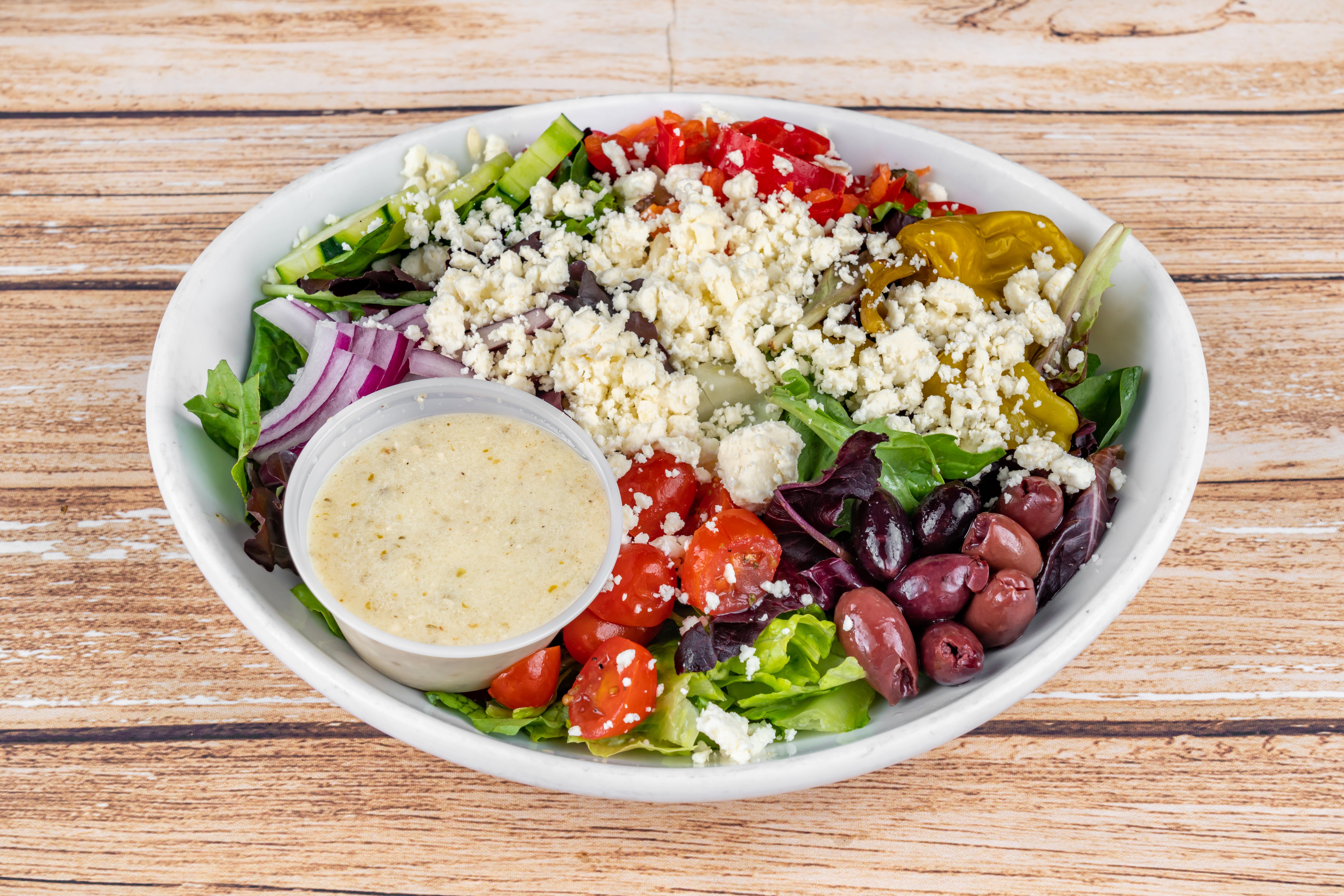Order Greek Salad - Salad food online from Angelos Pizza & Pasta store, Webster on bringmethat.com