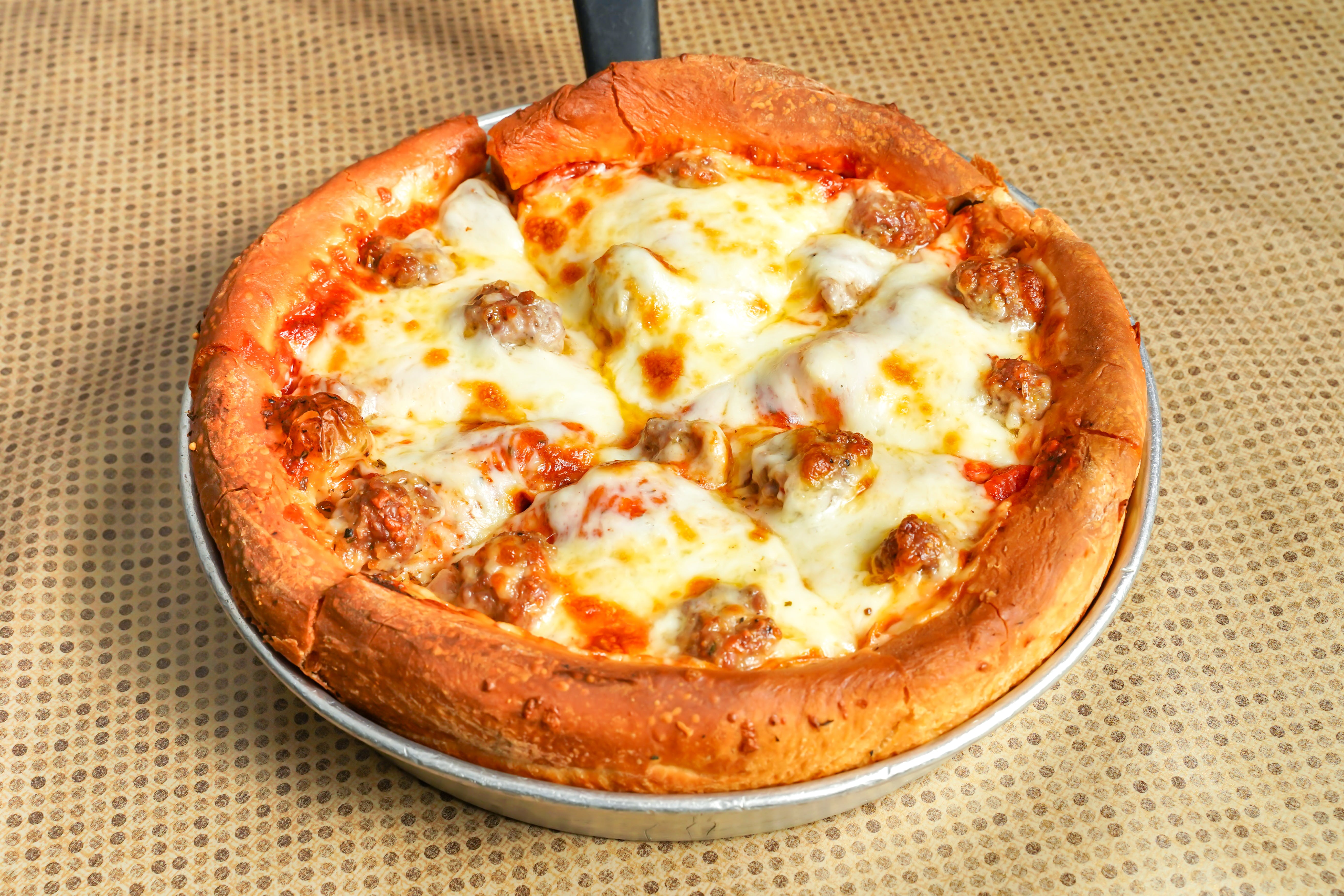 Order Deep Dish Pizza - Pizzarella 7" (4 Slices) food online from Connies Pizza By The Pier store, Chicago on bringmethat.com