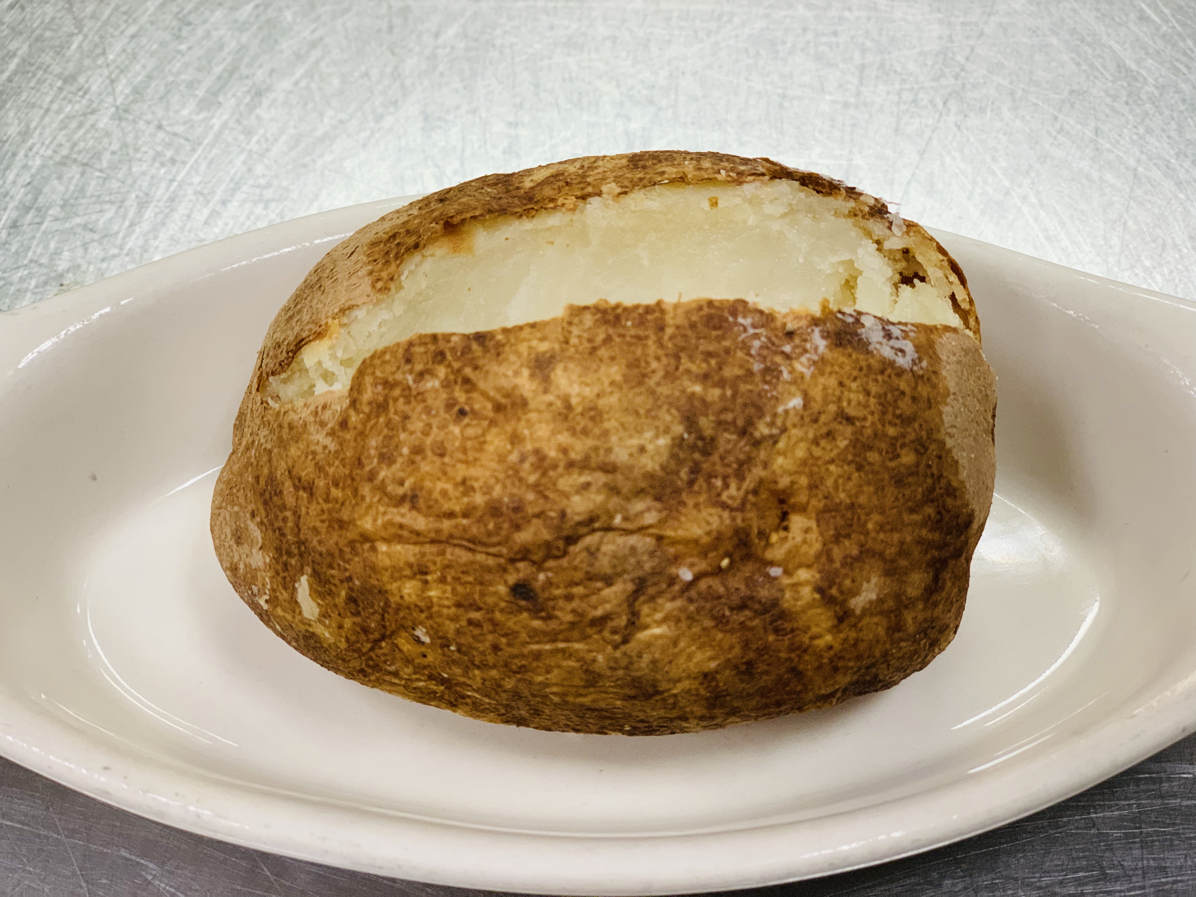 Order Baked Potato food online from Mojo Pub -N- Grill store, Youngstown on bringmethat.com