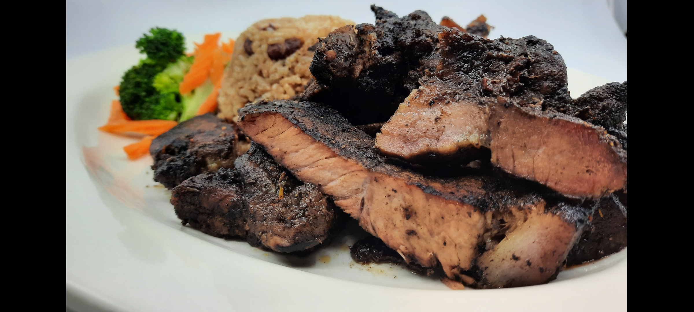 Order Jerk Pork  food online from Country Kitchen store, New Rochelle on bringmethat.com