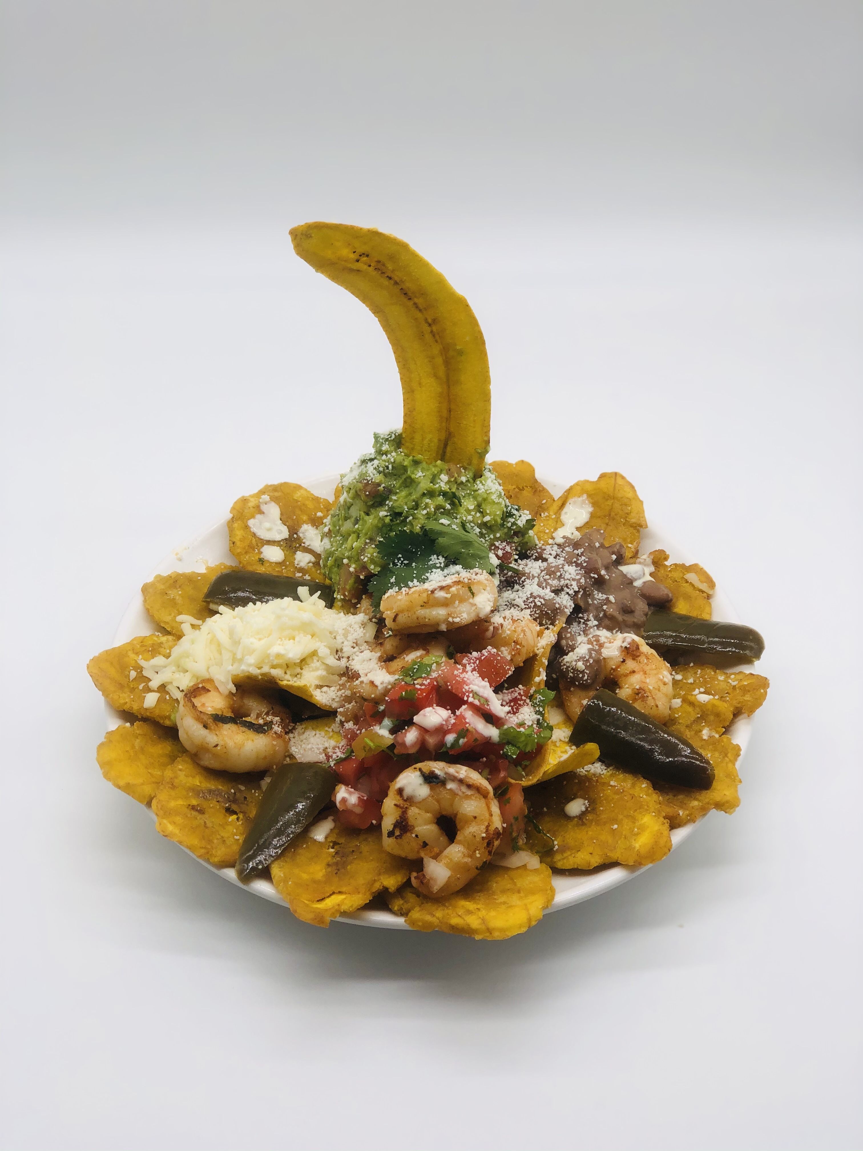 Order Fried Tostones & Shrimp Nacho food online from Tacos Y Jugos Genesis store, Elmhurst on bringmethat.com