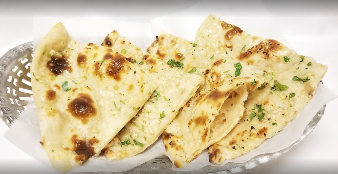 Order Garlic Naan food online from Royal Spice store, Linthicum Heights on bringmethat.com