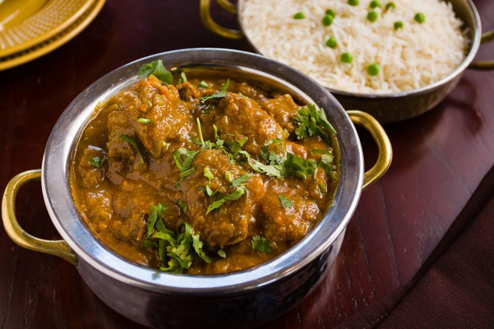 Order Punjab Da Murgh food online from Dhaba indian cuisine store, New York on bringmethat.com
