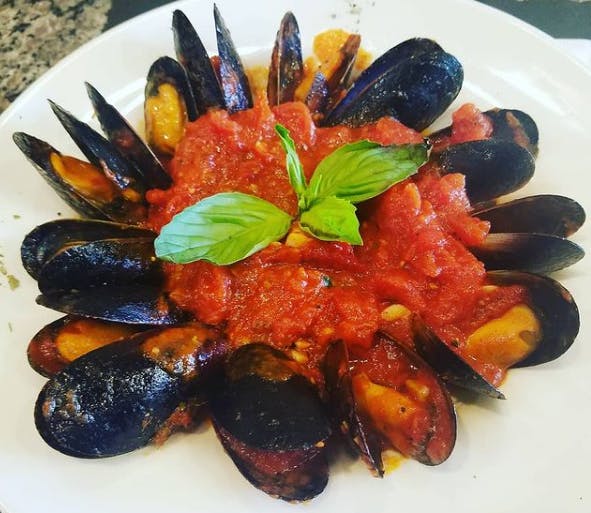 Order Mussels Marinara - Appetizer food online from Phil's Pizzeria & Restaurant store, Montvale on bringmethat.com