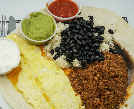 Order Huevos Rancheros food online from Coach House Diner Restaurant store, North Bergen on bringmethat.com